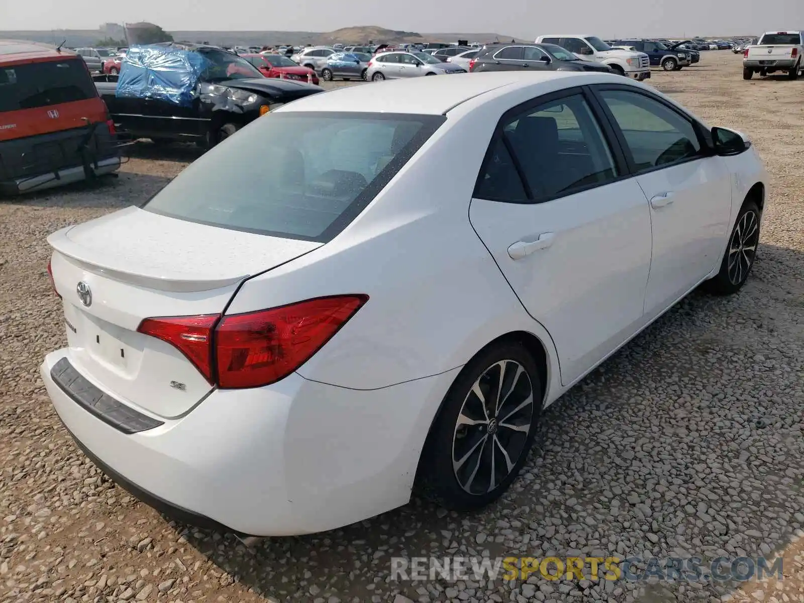 4 Photograph of a damaged car 5YFBURHEXKP883129 TOYOTA COROLLA 2019