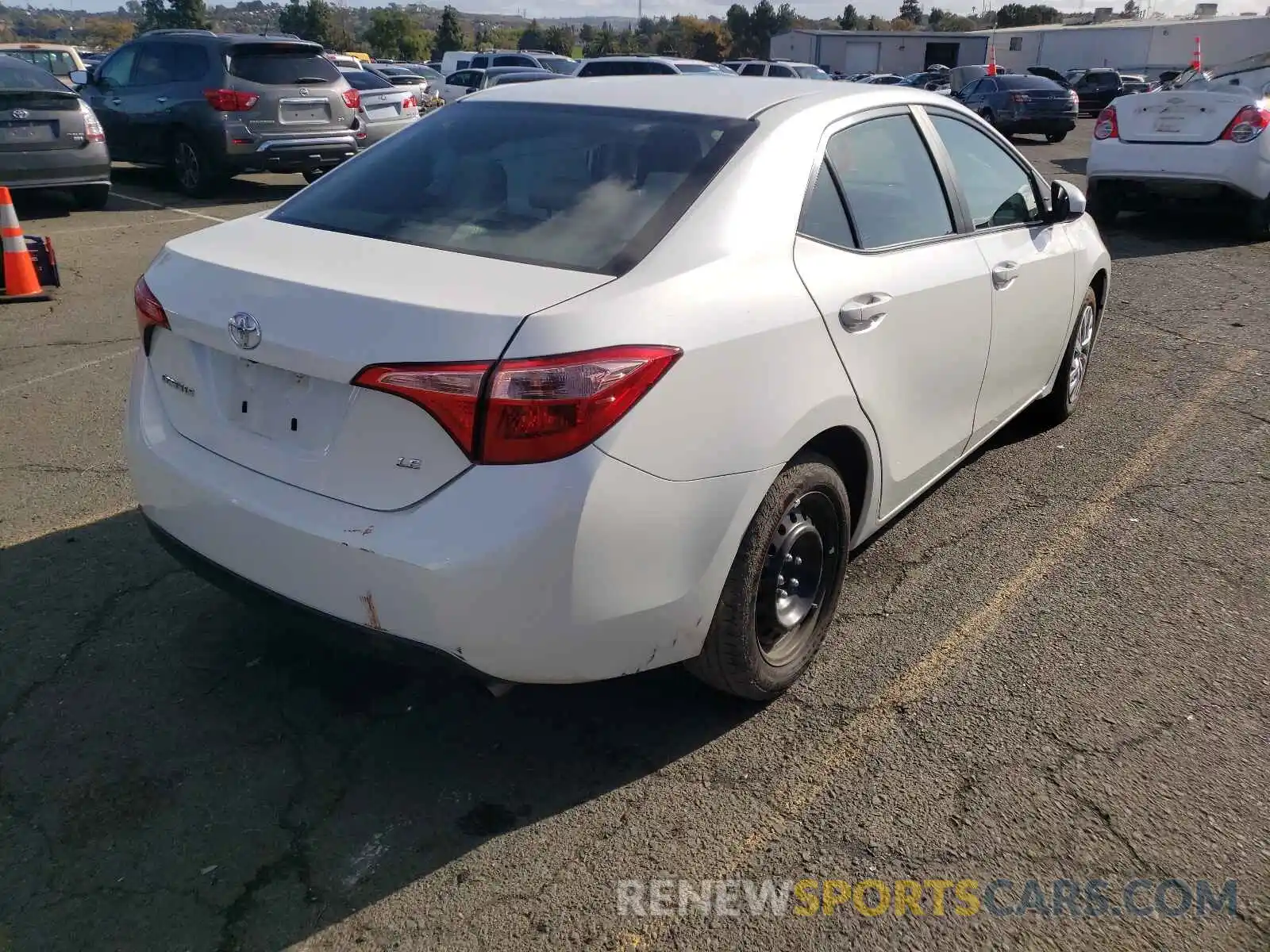 4 Photograph of a damaged car 5YFBURHEXKP885933 TOYOTA COROLLA 2019