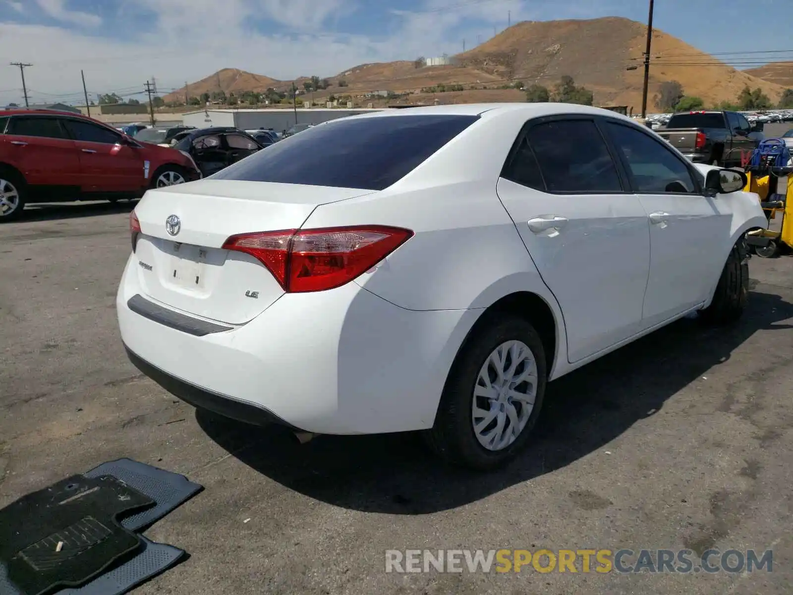 4 Photograph of a damaged car 5YFBURHEXKP890677 TOYOTA COROLLA 2019