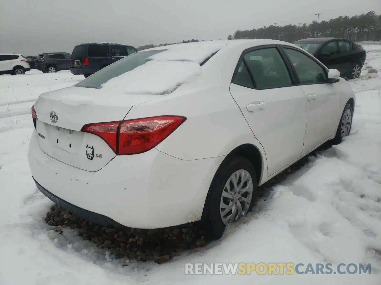 4 Photograph of a damaged car 5YFBURHEXKP906313 TOYOTA COROLLA 2019