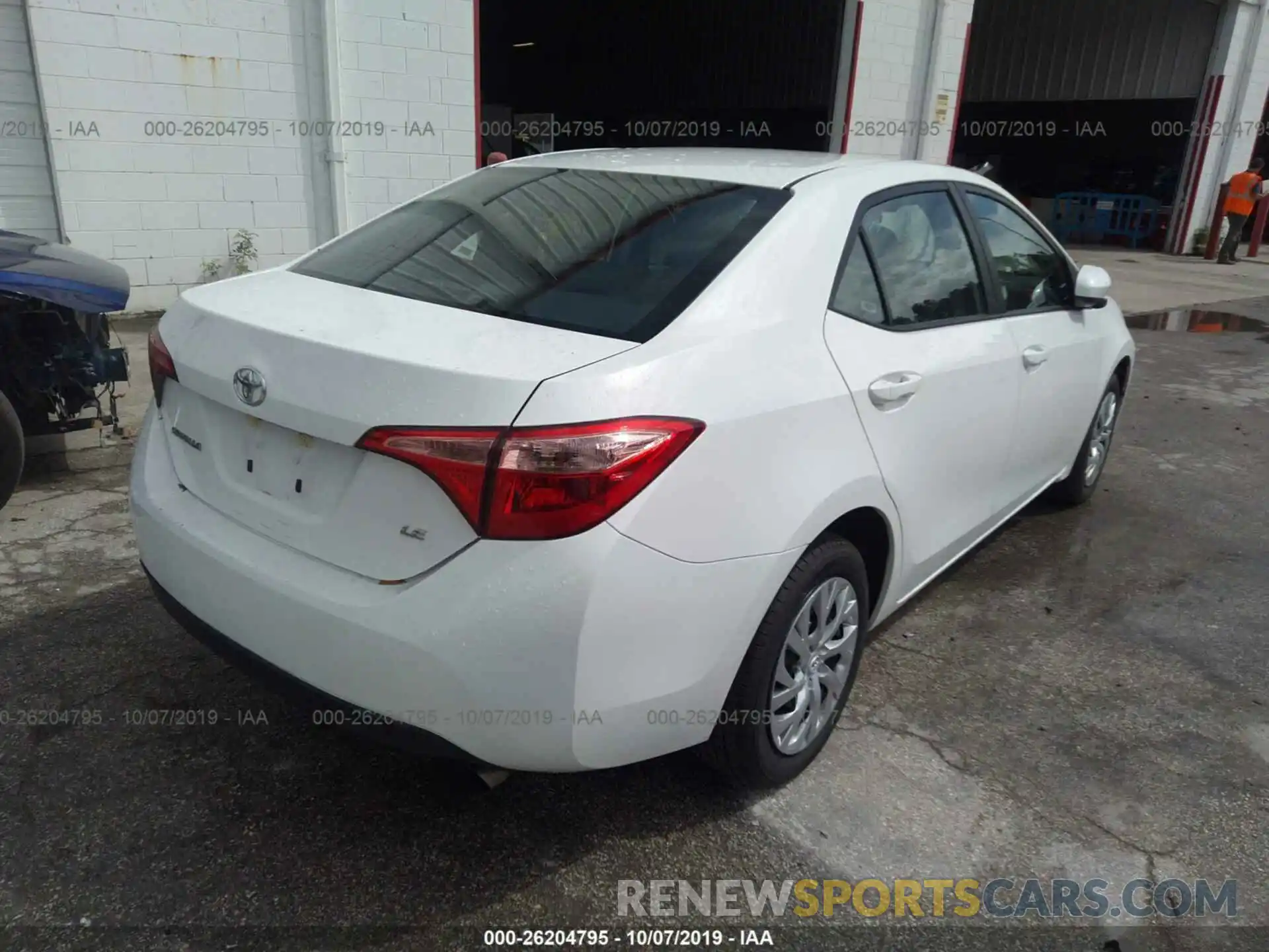 4 Photograph of a damaged car 5YFBURHEXKP909440 TOYOTA COROLLA 2019