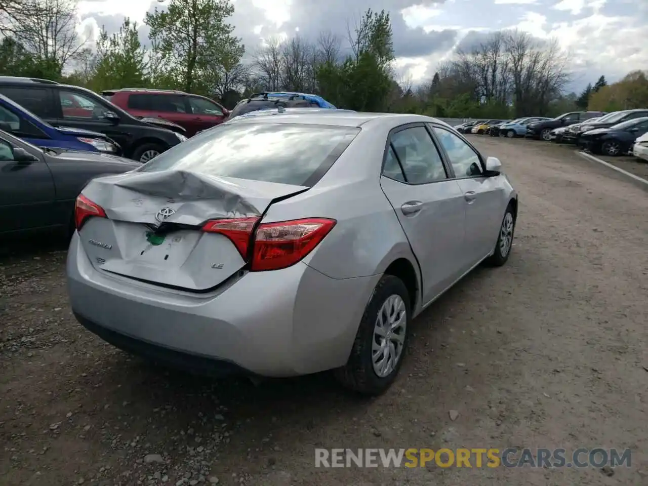 4 Photograph of a damaged car 5YFBURHEXKP921586 TOYOTA COROLLA 2019