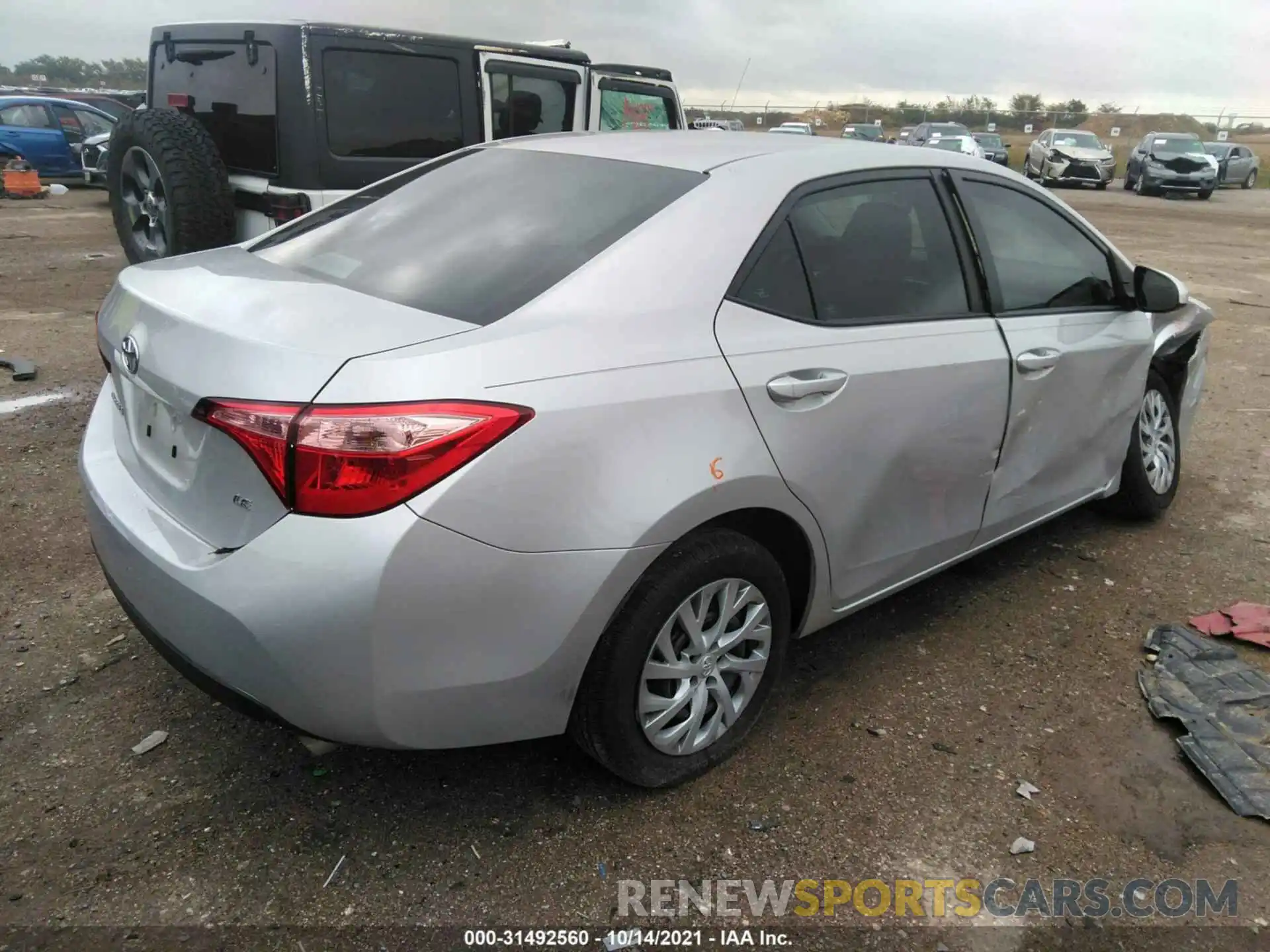 4 Photograph of a damaged car 5YFBURHEXKP925413 TOYOTA COROLLA 2019