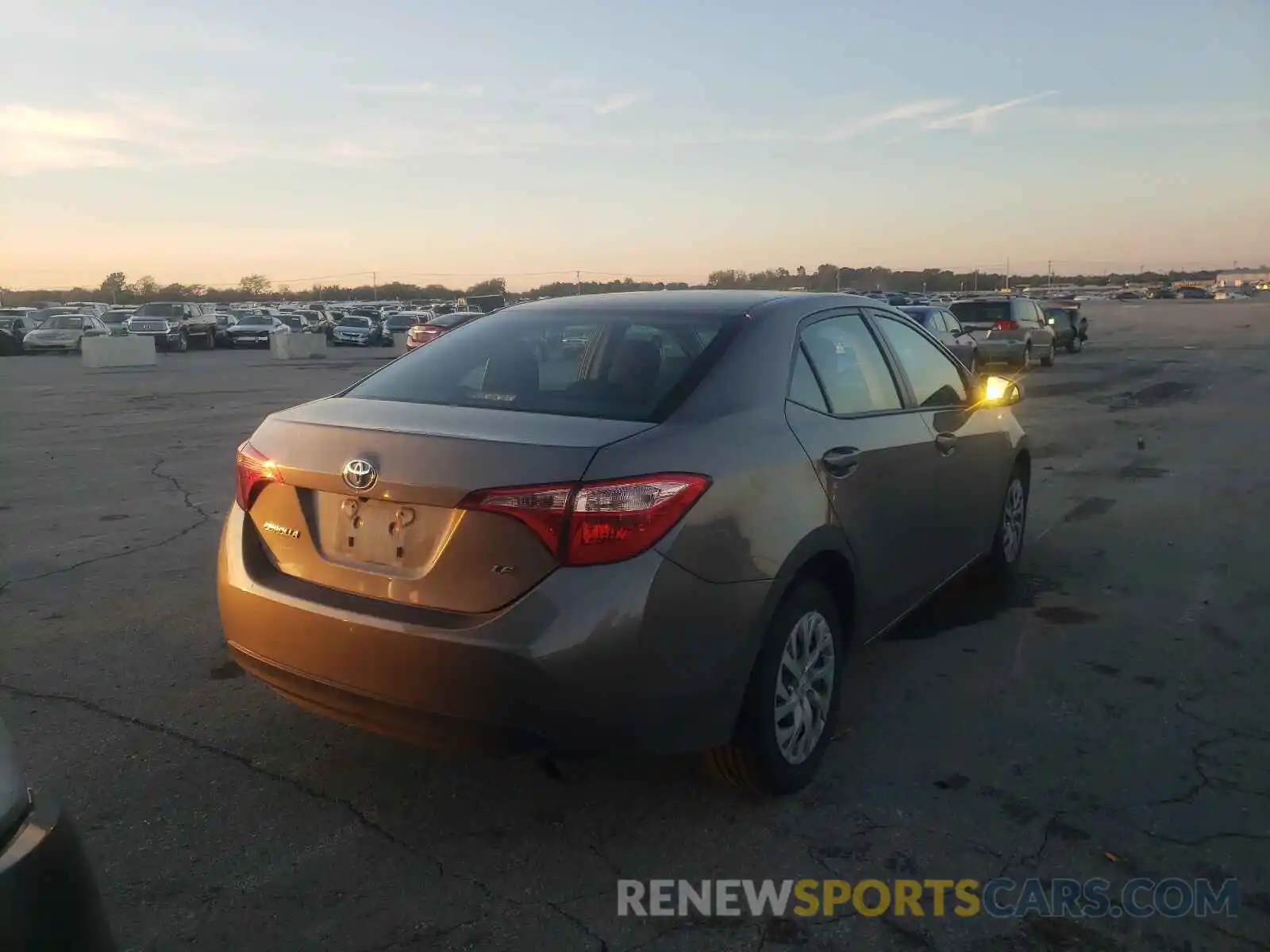 4 Photograph of a damaged car 5YFBURHEXKP936153 TOYOTA COROLLA 2019