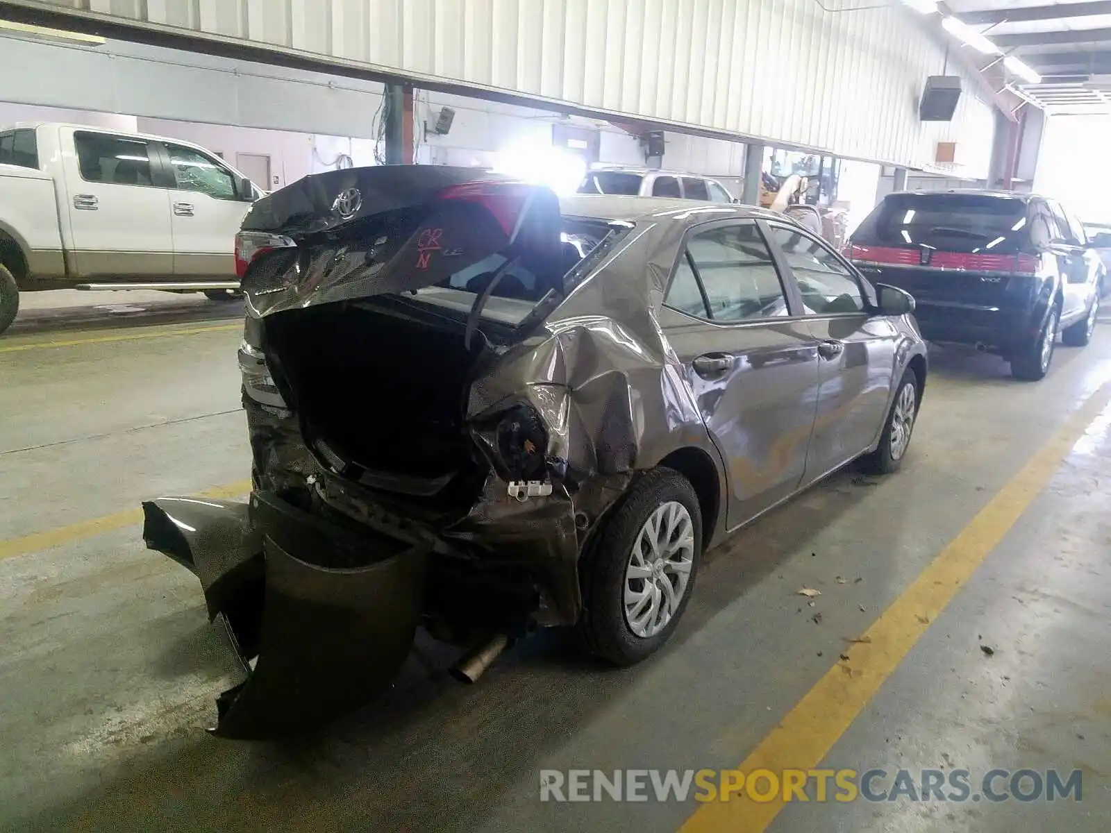 4 Photograph of a damaged car 5YFBURHEXKP936959 TOYOTA COROLLA 2019