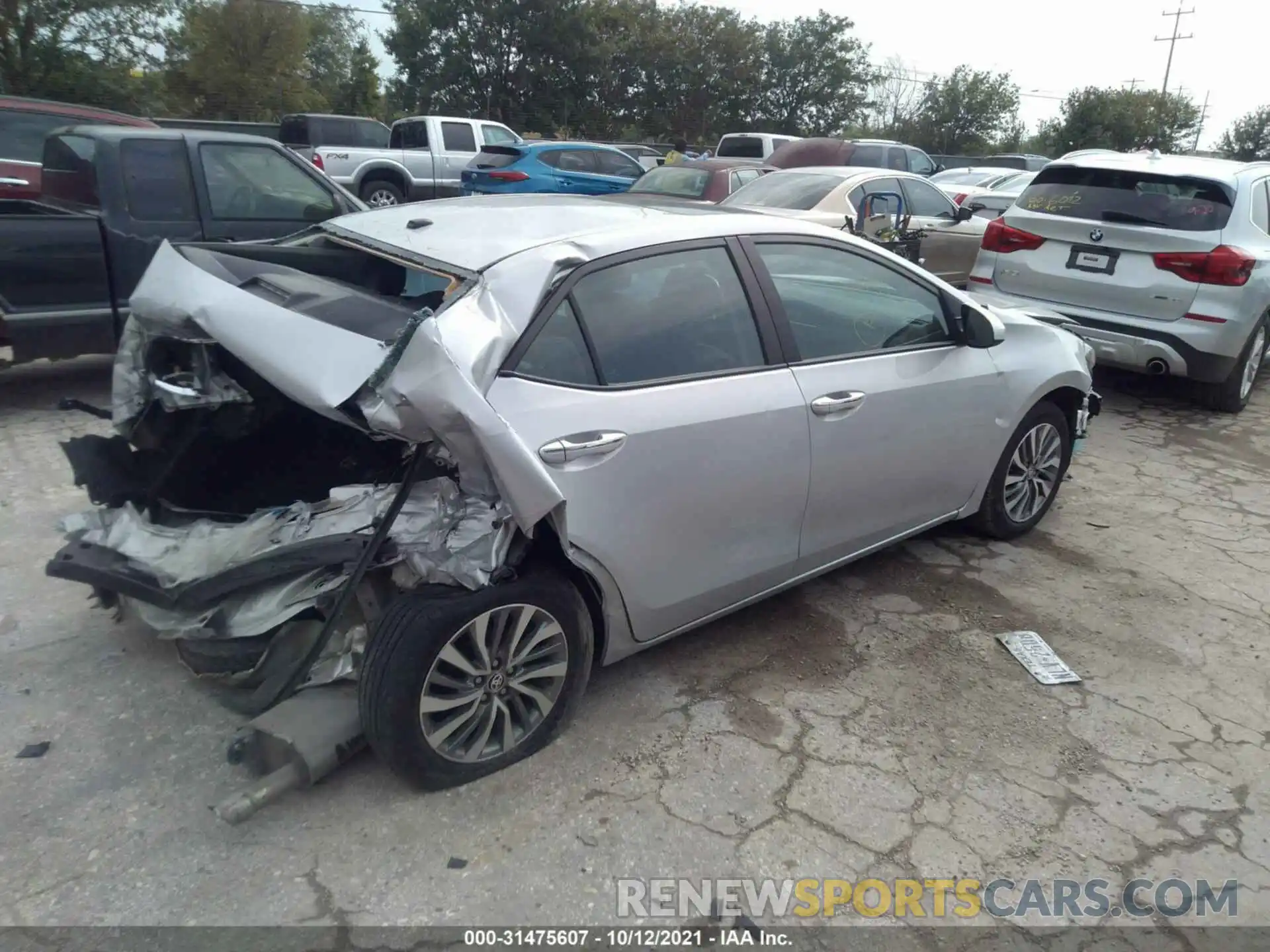 4 Photograph of a damaged car 5YFBURHEXKP946794 TOYOTA COROLLA 2019