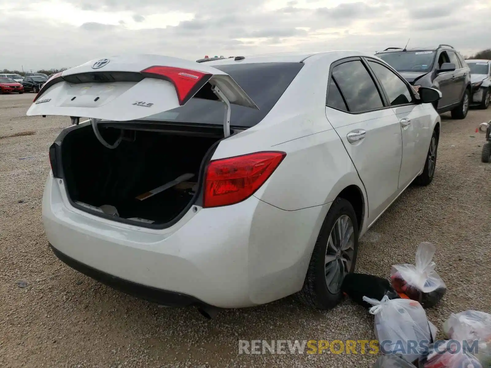 4 Photograph of a damaged car 5YFBURHEXKP948609 TOYOTA COROLLA 2019