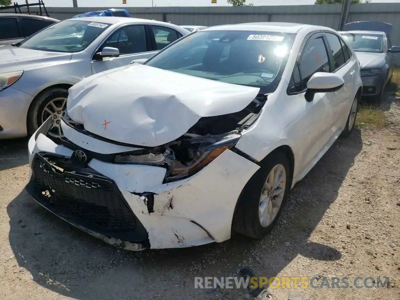 2 Photograph of a damaged car 5YFHPRAE4LP021165 TOYOTA COROLLA 2020