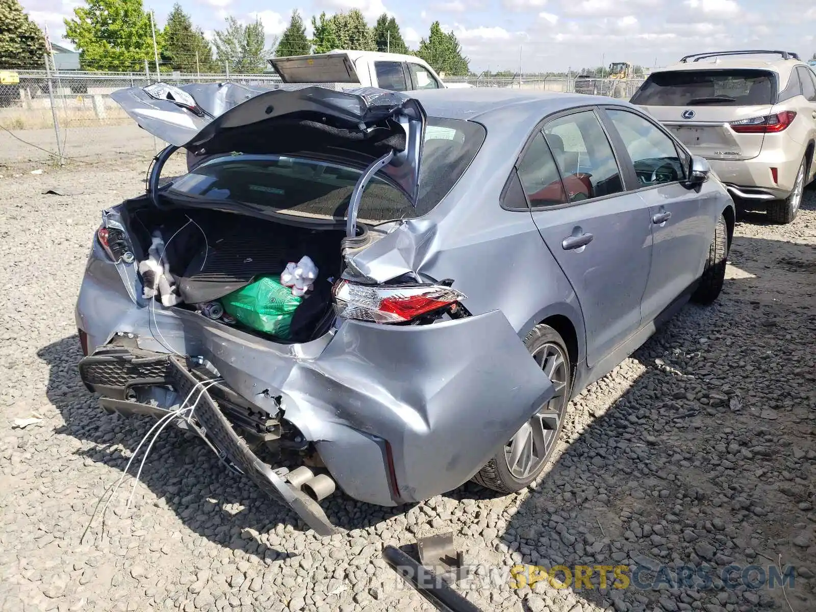 4 Photograph of a damaged car 5YFP4RCE6LP011884 TOYOTA COROLLA 2020