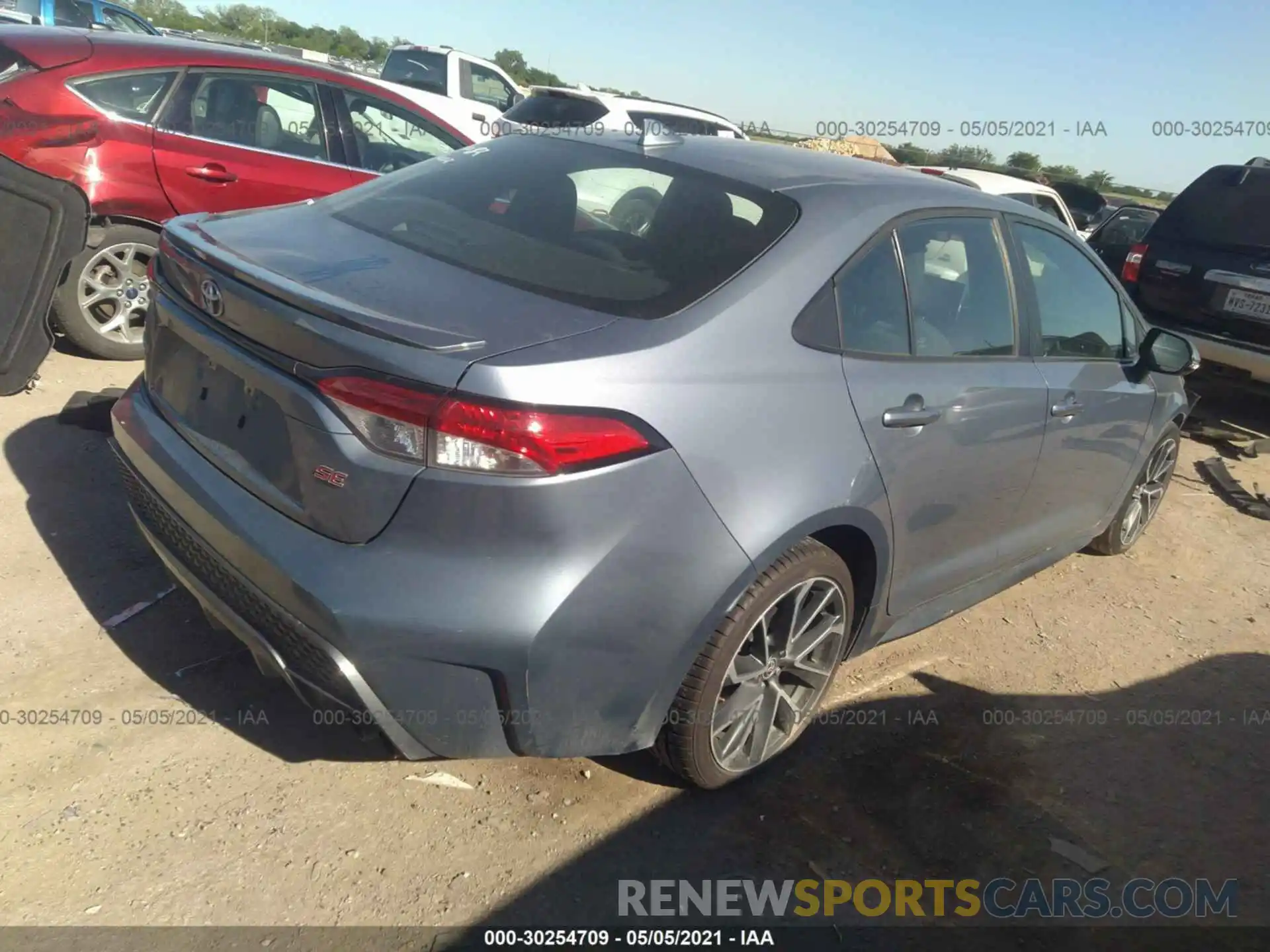 4 Photograph of a damaged car 5YFS4RCE0LP014399 TOYOTA COROLLA 2020