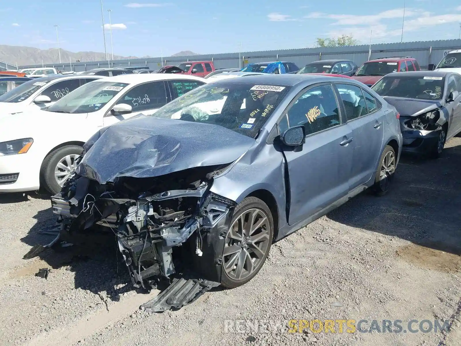 2 Photograph of a damaged car 5YFS4RCE5LP015631 TOYOTA COROLLA 2020