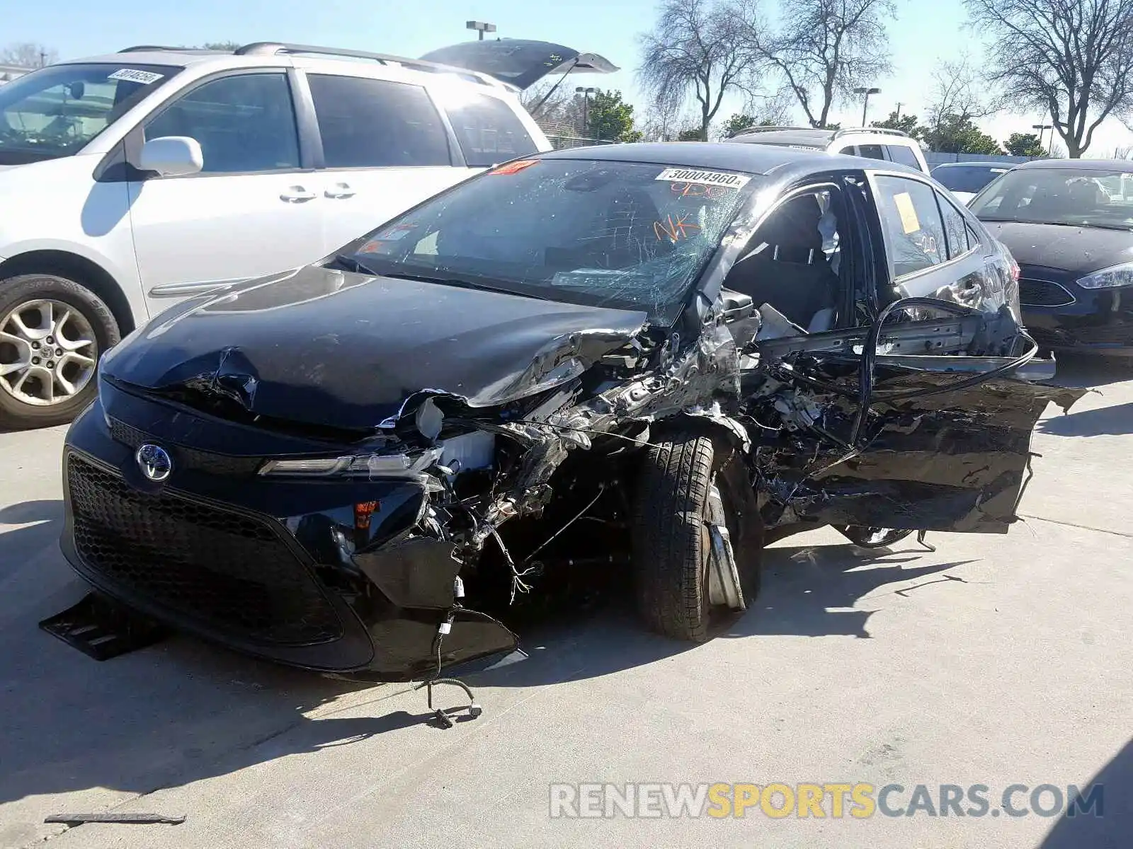 2 Photograph of a damaged car JTDEBRBE0LJ009406 TOYOTA COROLLA 2020