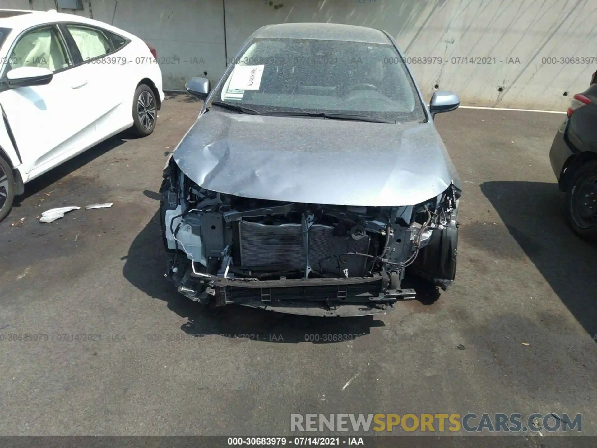 6 Photograph of a damaged car JTDEBRBE4LJ009831 TOYOTA COROLLA 2020