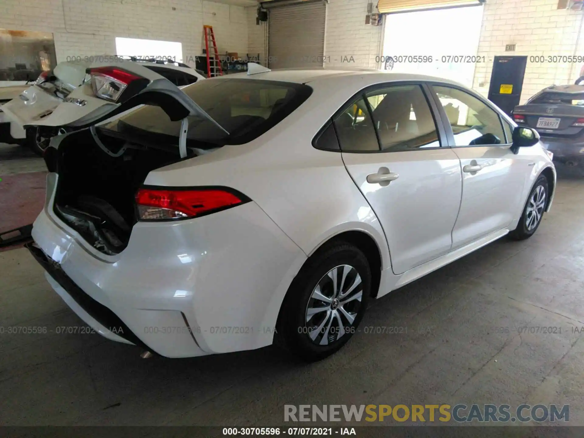 4 Photograph of a damaged car JTDEBRBE4LJ025950 TOYOTA COROLLA 2020