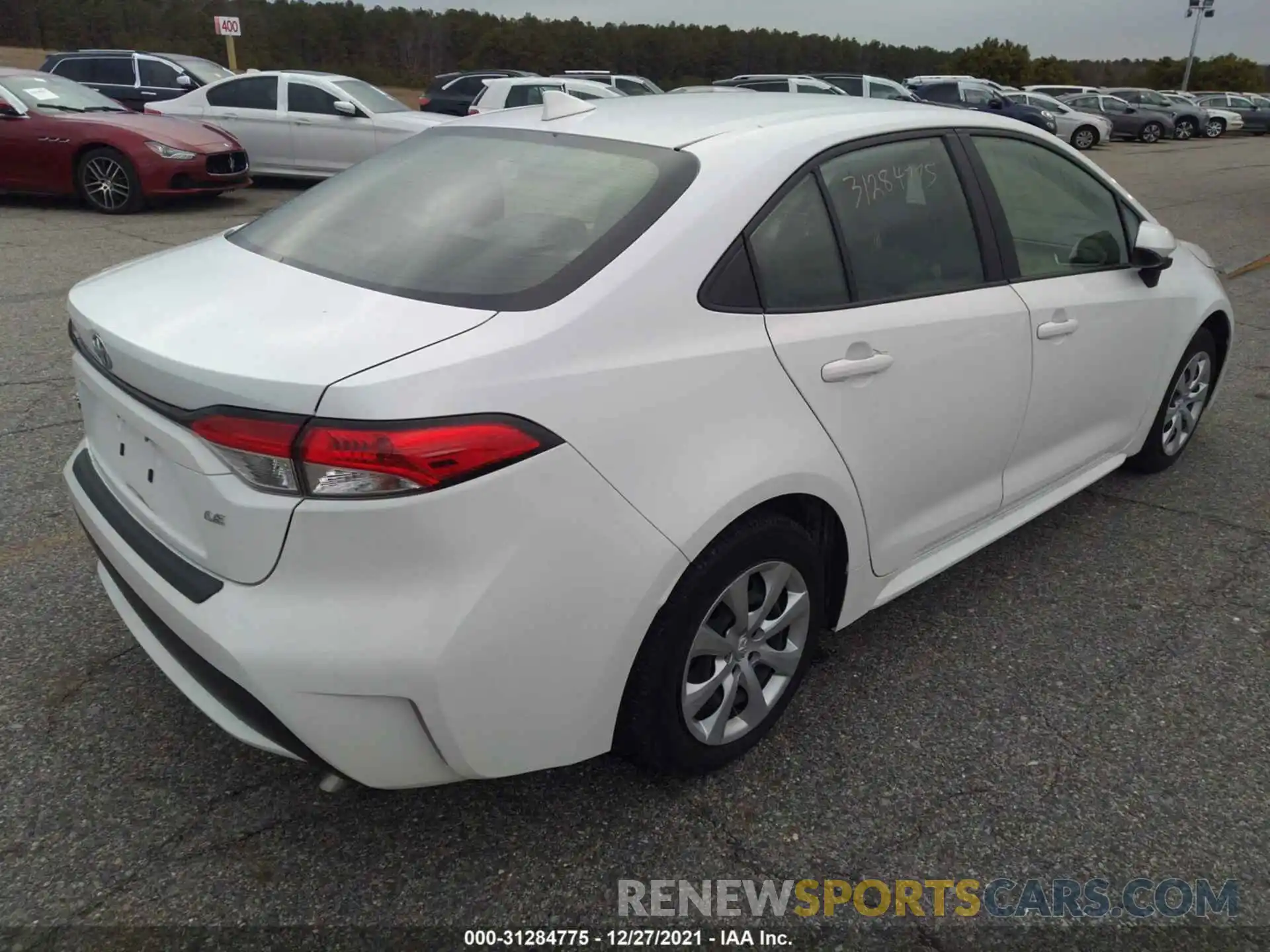 4 Photograph of a damaged car JTDEPRAE0LJ016424 TOYOTA COROLLA 2020