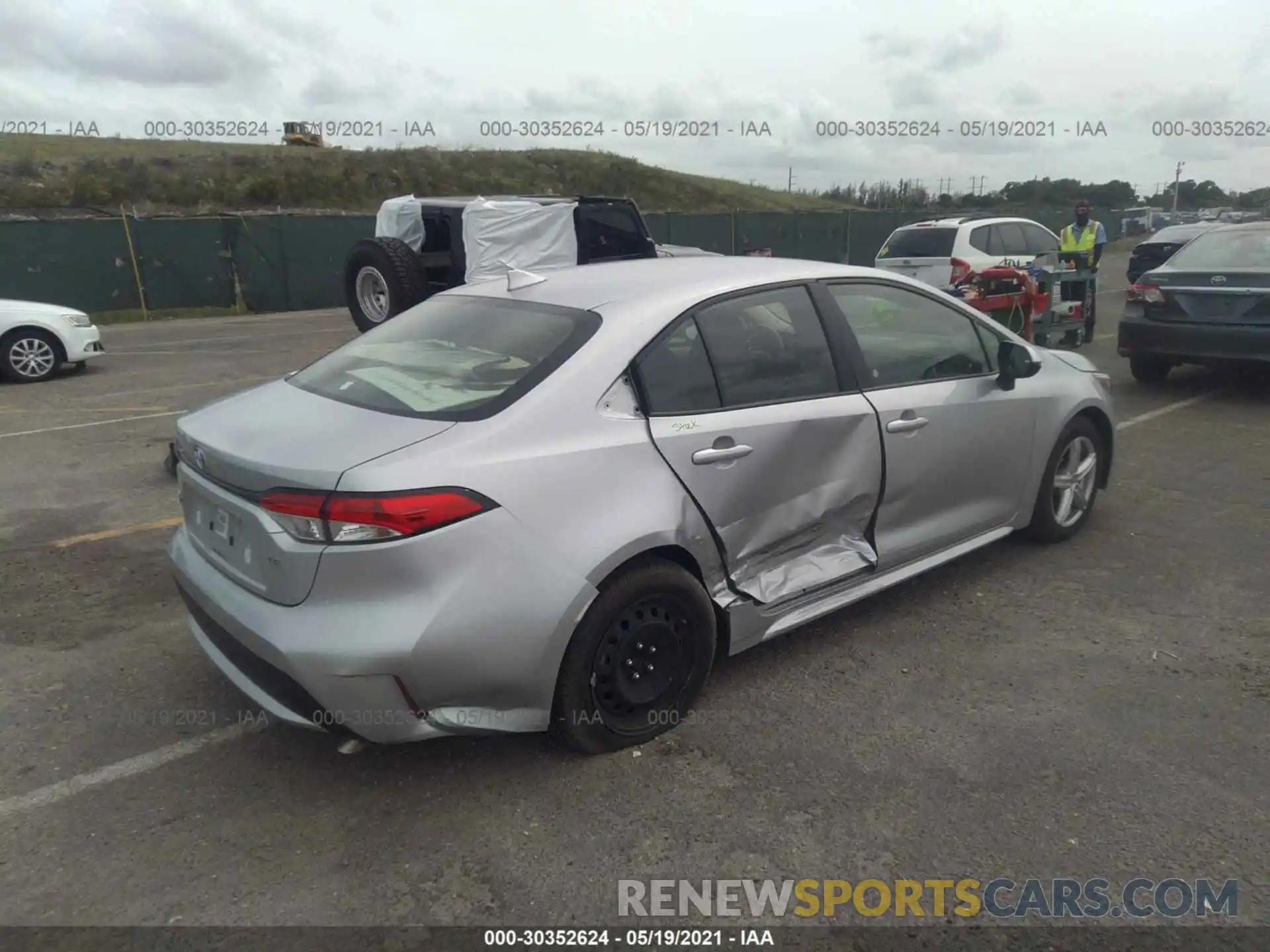 4 Photograph of a damaged car JTDEPRAE0LJ087395 TOYOTA COROLLA 2020