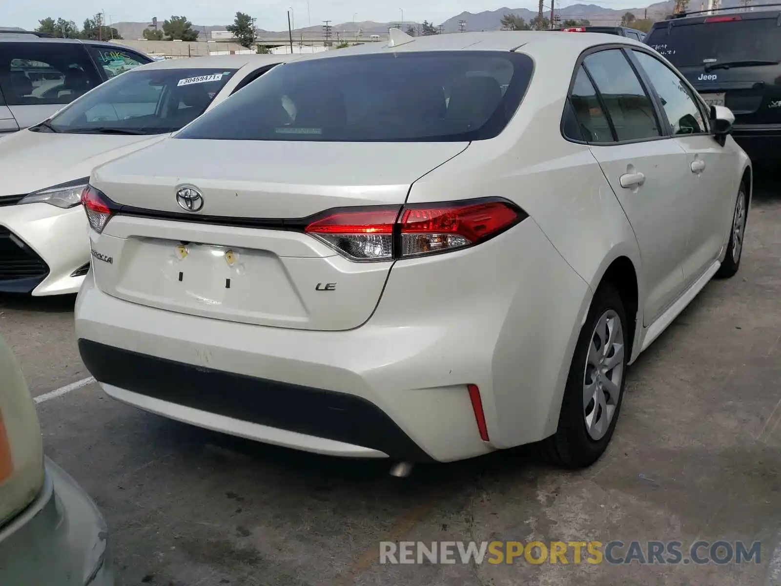 4 Photograph of a damaged car JTDEPRAE0LJ102025 TOYOTA COROLLA 2020