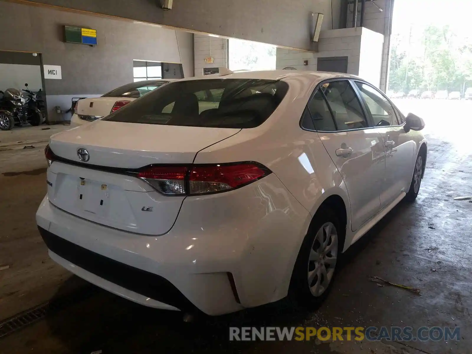 4 Photograph of a damaged car JTDEPRAE1LJ023379 TOYOTA COROLLA 2020