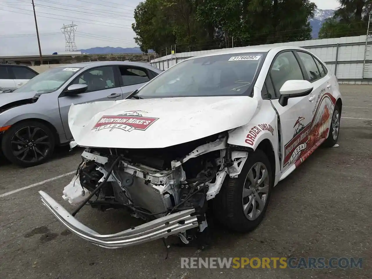 2 Photograph of a damaged car JTDEPRAE1LJ039503 TOYOTA COROLLA 2020