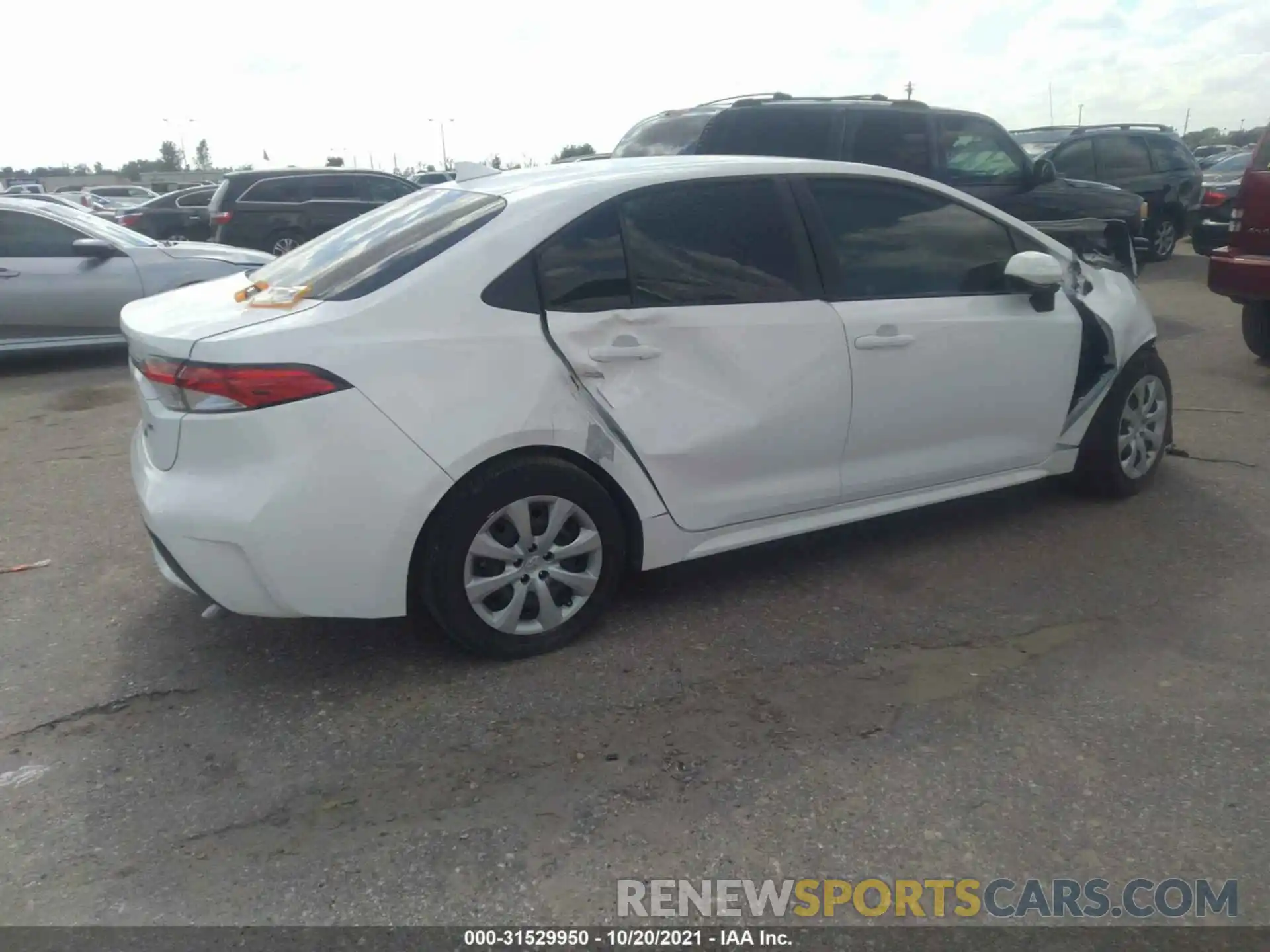 4 Photograph of a damaged car JTDEPRAE2LJ043611 TOYOTA COROLLA 2020