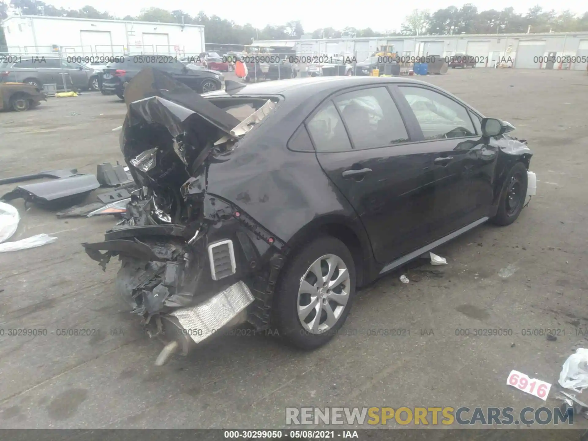 4 Photograph of a damaged car JTDEPRAE7LJ092383 TOYOTA COROLLA 2020