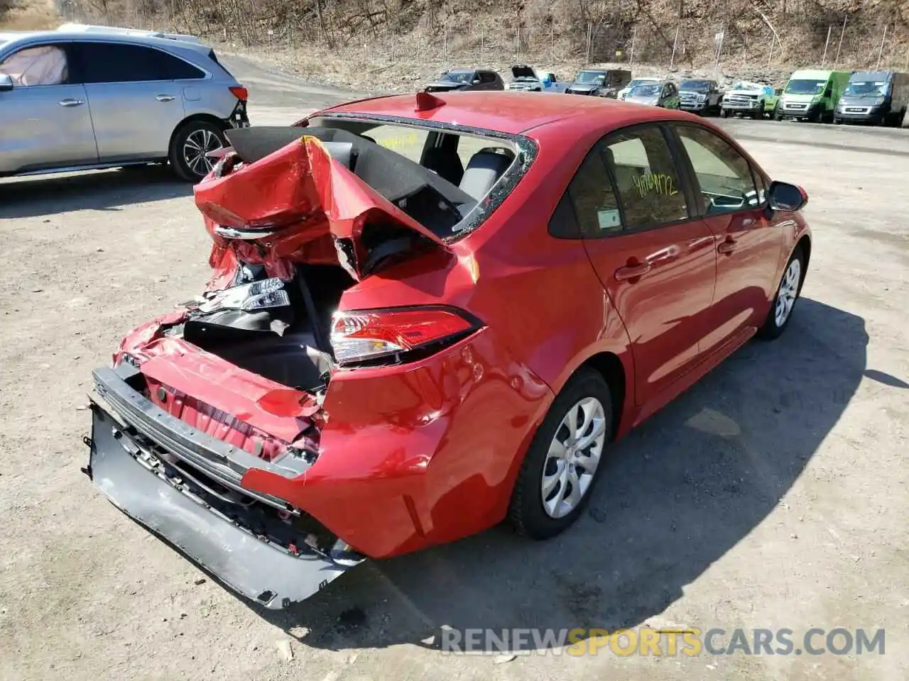 4 Photograph of a damaged car JTDEPRAE8LJ046383 TOYOTA COROLLA 2020