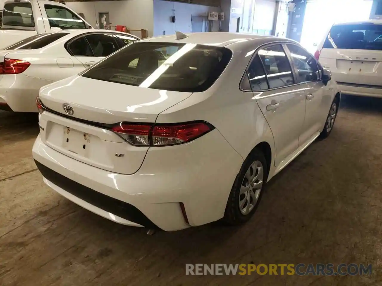 4 Photograph of a damaged car JTDEPRAE9LJ089243 TOYOTA COROLLA 2020