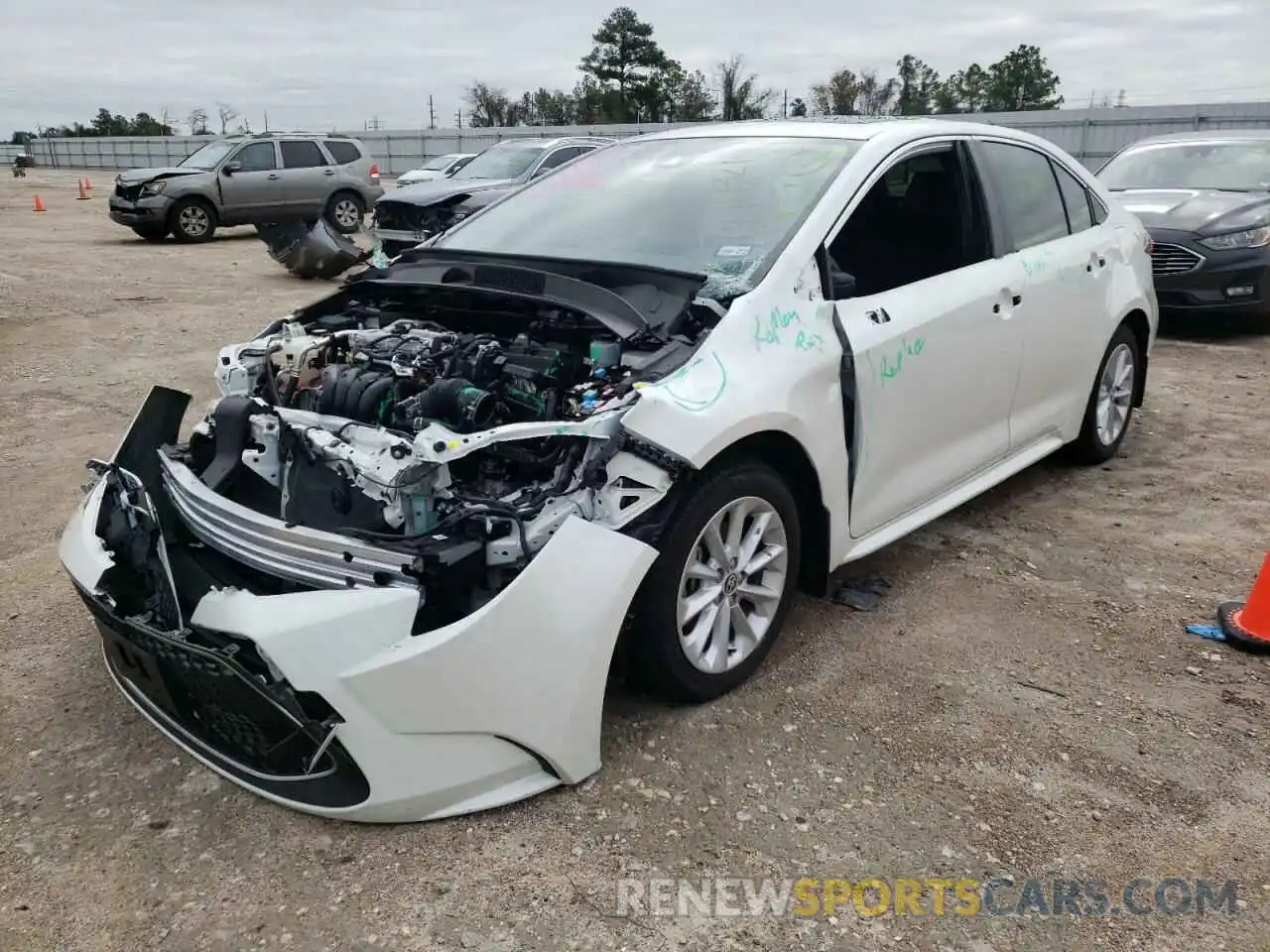 2 Photograph of a damaged car JTDFPRAE2LJ063278 TOYOTA COROLLA 2020