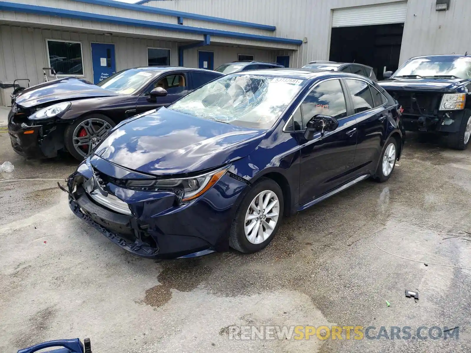 2 Photograph of a damaged car JTDFPRAE9LJ004261 TOYOTA COROLLA 2020