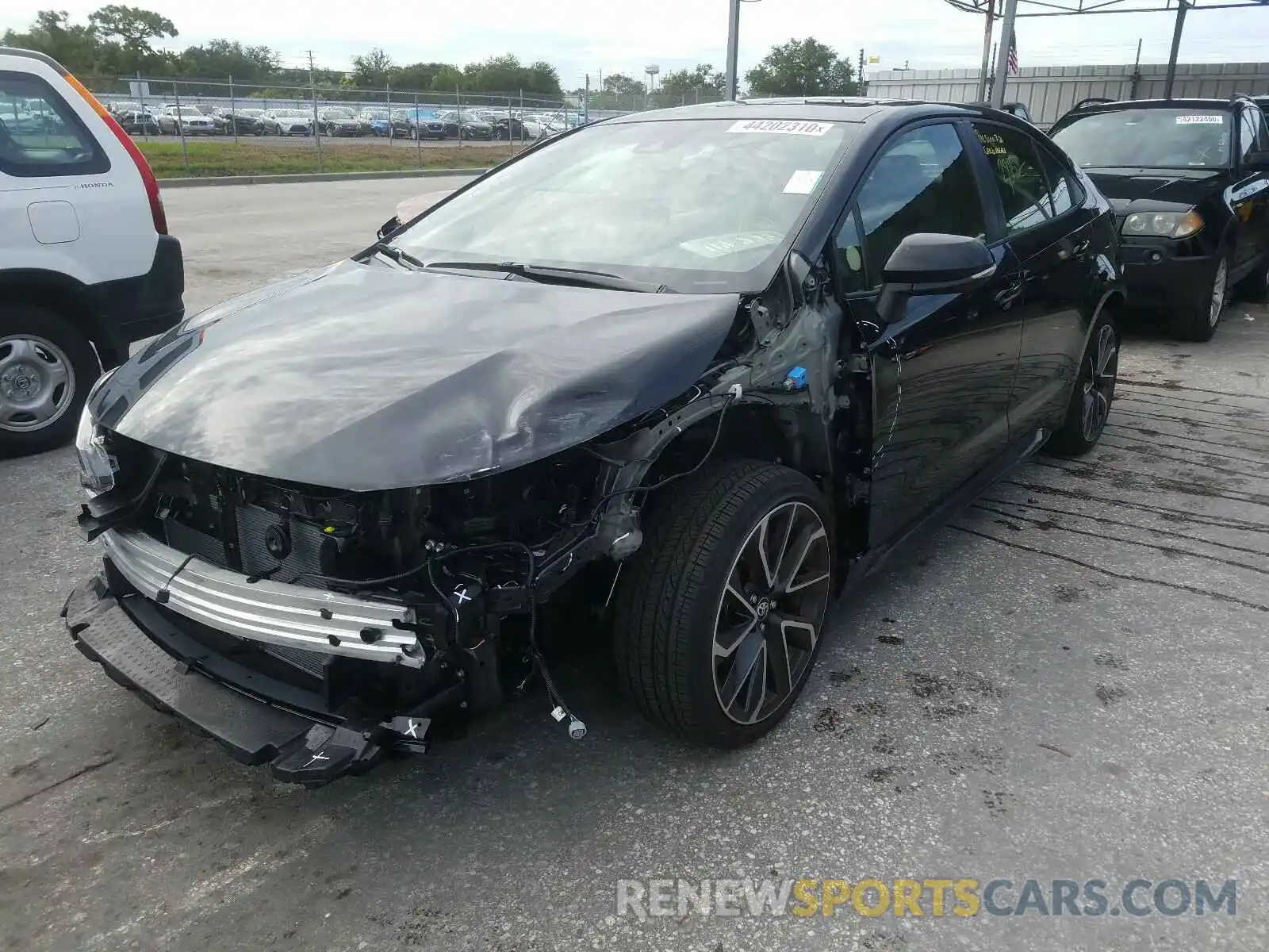 2 Photograph of a damaged car JTDM4RCE3LJ031503 TOYOTA COROLLA 2020