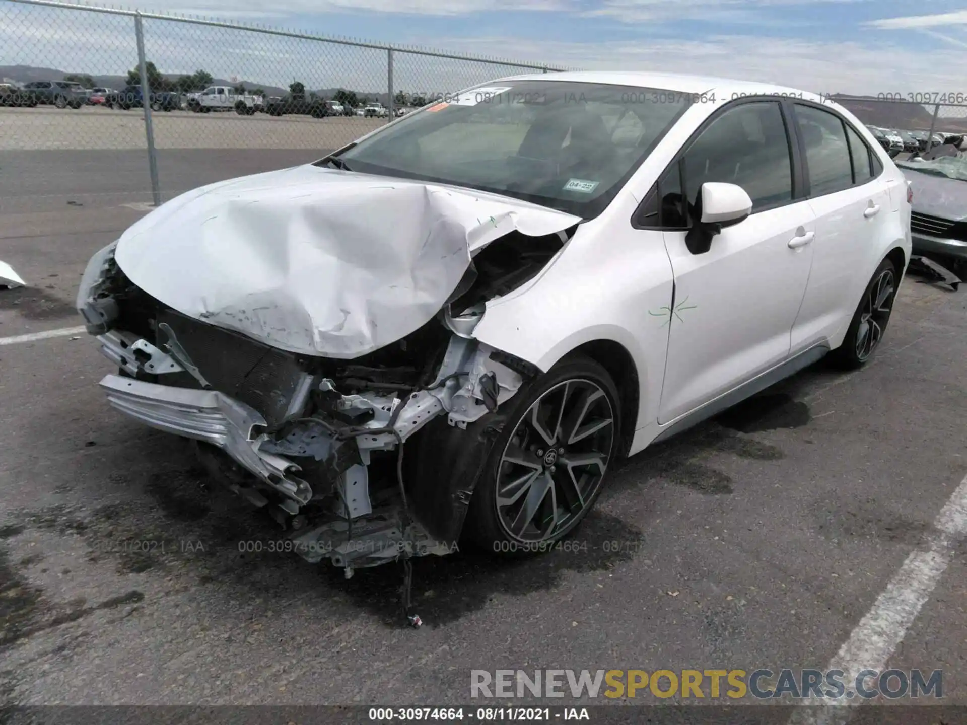 2 Photograph of a damaged car JTDS4RCE6LJ009860 TOYOTA COROLLA 2020