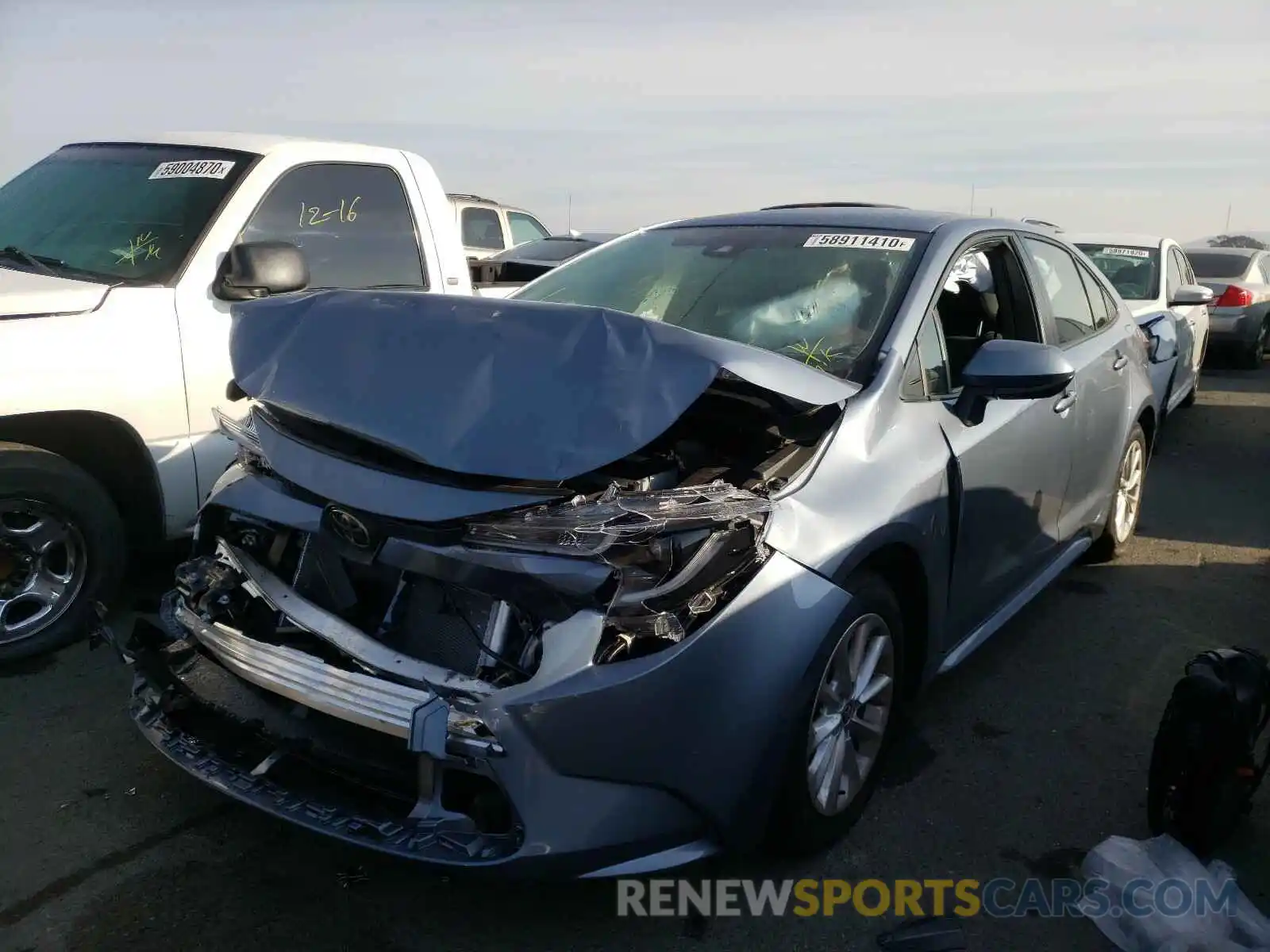 2 Photograph of a damaged car JTDVPRAE7LJ076703 TOYOTA COROLLA 2020