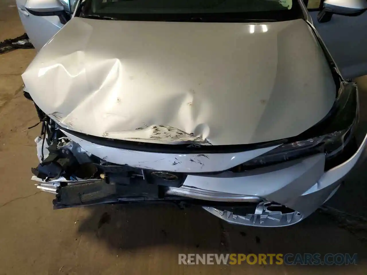 11 Photograph of a damaged car 5YFEPMAE2MP220660 TOYOTA COROLLA 2021