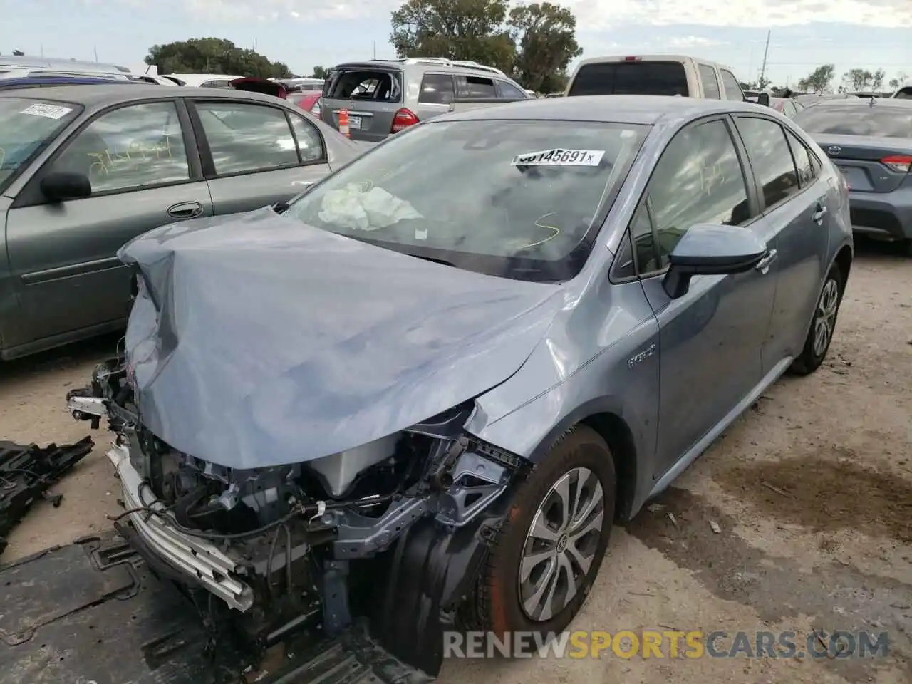 2 Photograph of a damaged car JTDEAMDE2MJ006947 TOYOTA COROLLA 2021