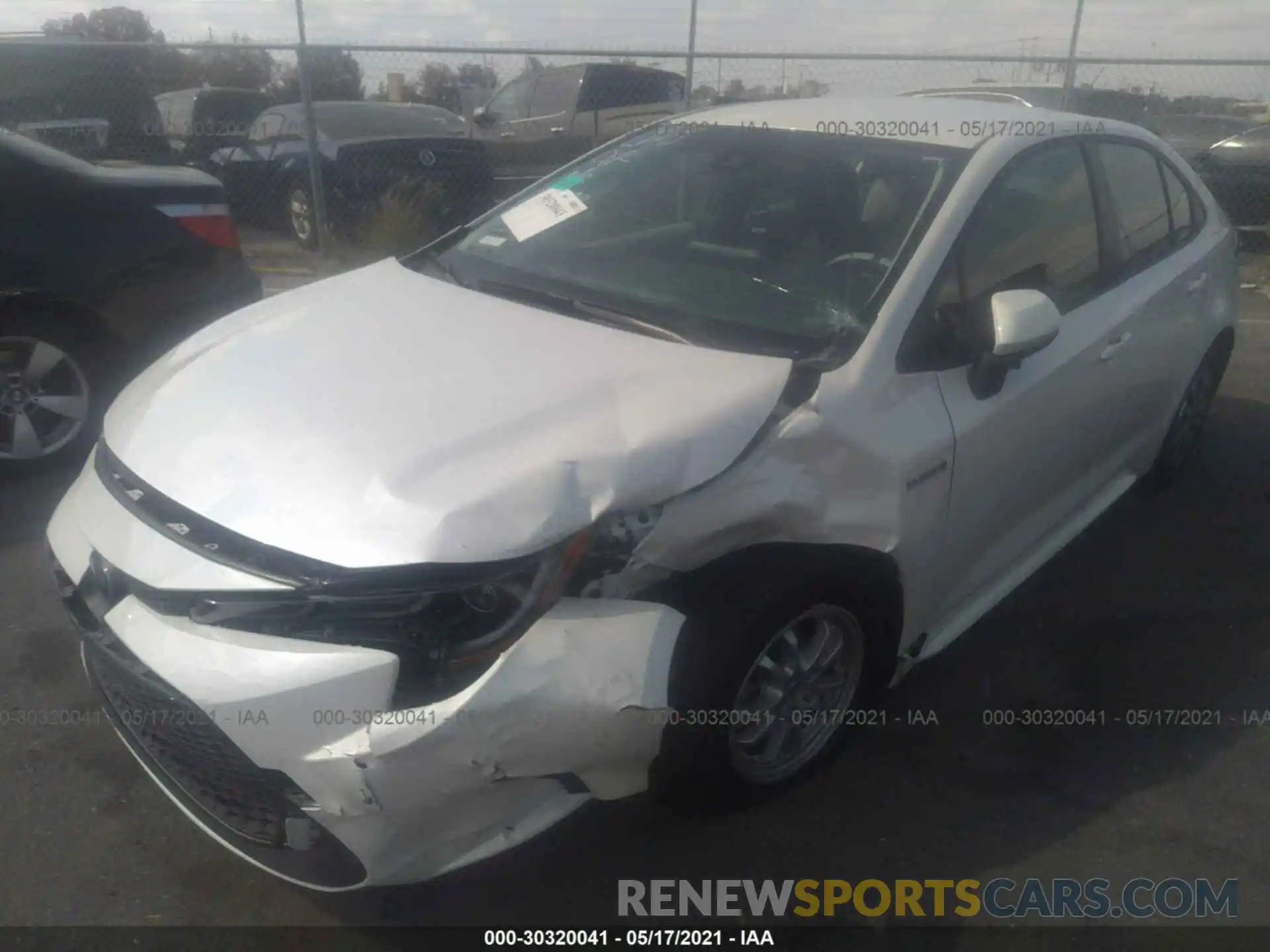 2 Photograph of a damaged car JTDEAMDE4MJ015665 TOYOTA COROLLA 2021