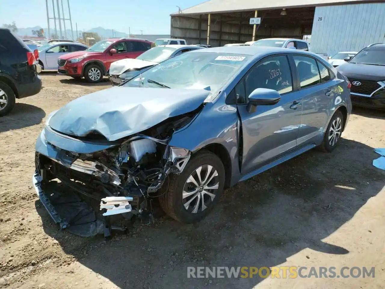 2 Photograph of a damaged car JTDEAMDE4MJ027587 TOYOTA COROLLA 2021