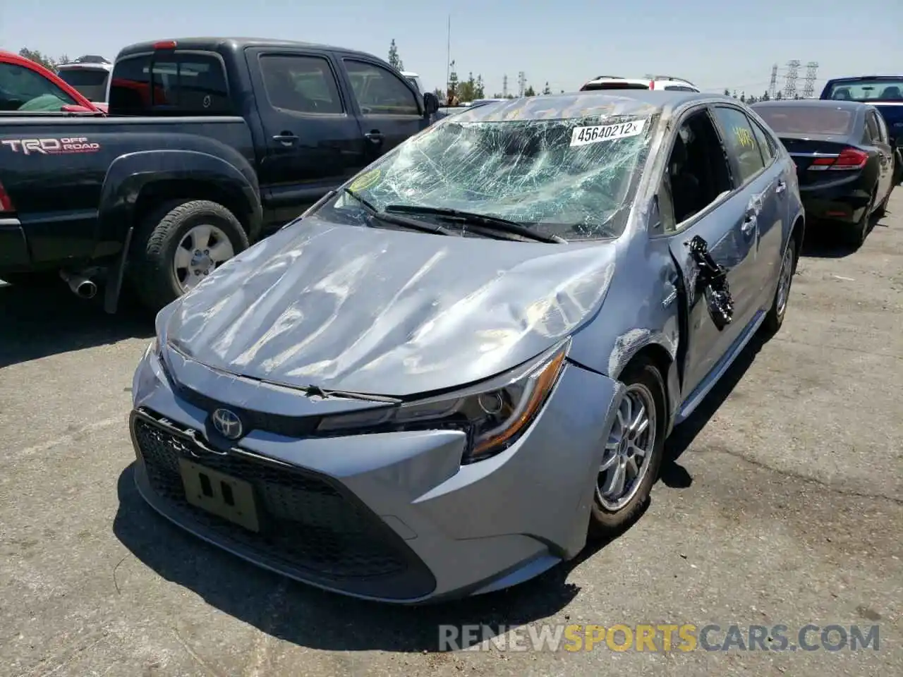 2 Photograph of a damaged car JTDEAMDE5MJ010328 TOYOTA COROLLA 2021