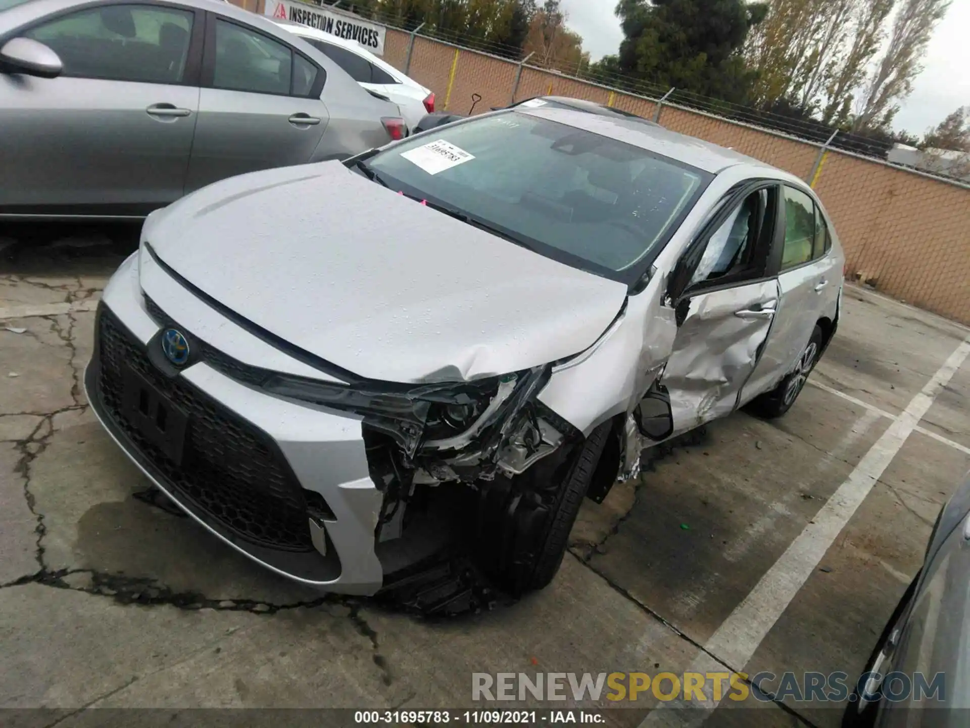 2 Photograph of a damaged car JTDEAMDE5MJ016632 TOYOTA COROLLA 2021