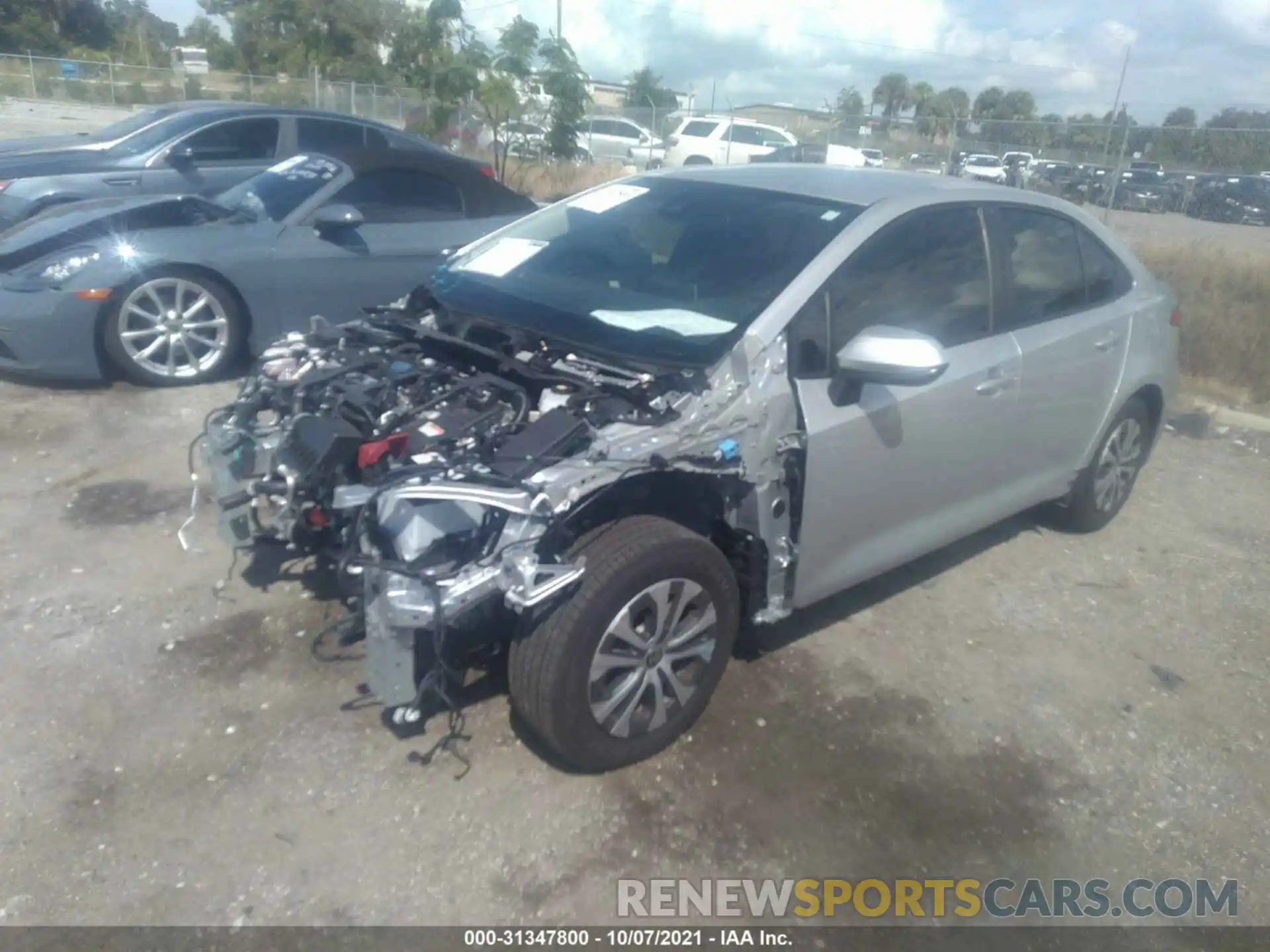 2 Photograph of a damaged car JTDEAMDE5MJ023998 TOYOTA COROLLA 2021