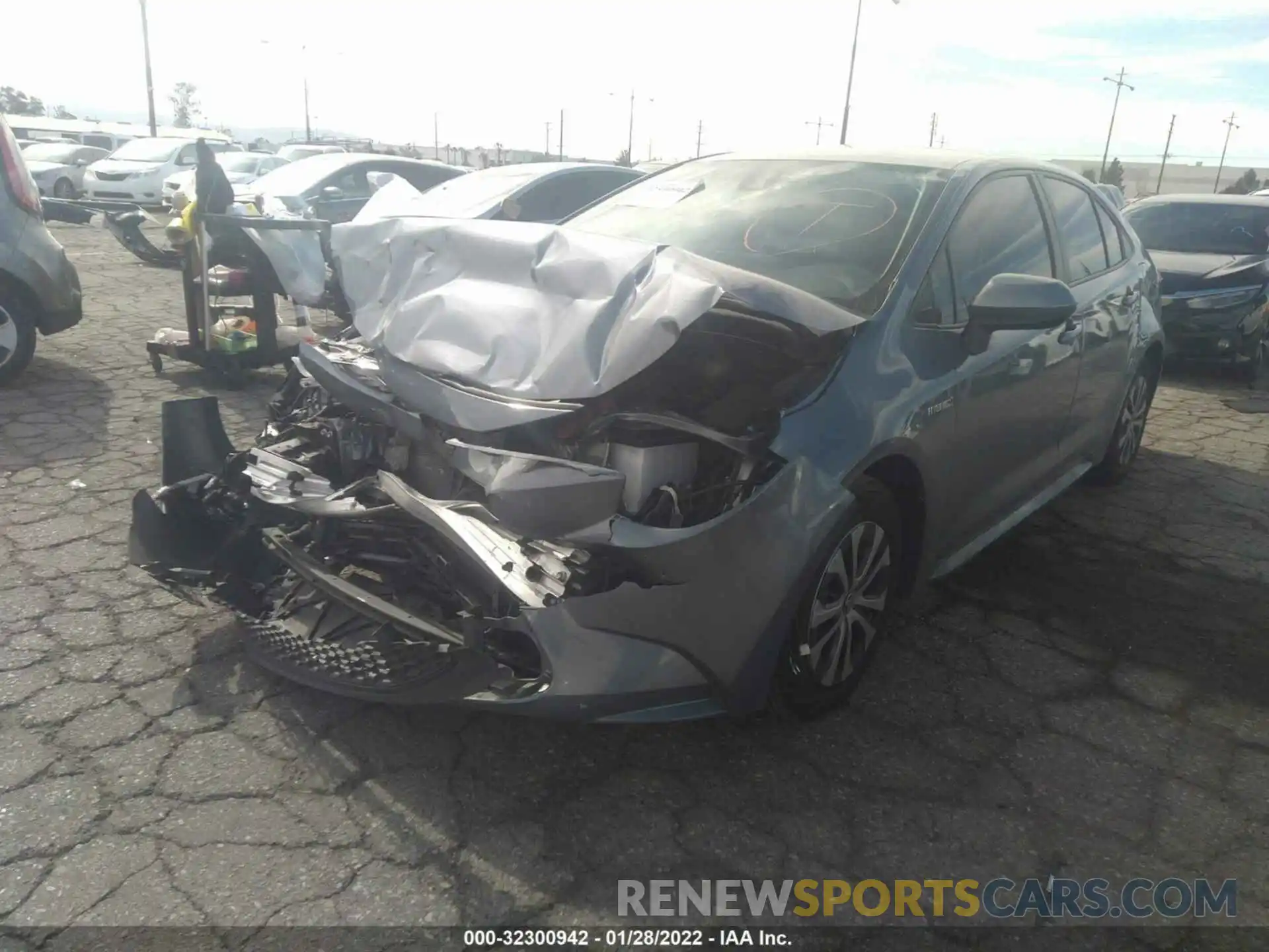 2 Photograph of a damaged car JTDEAMDE7MJ014896 TOYOTA COROLLA 2021