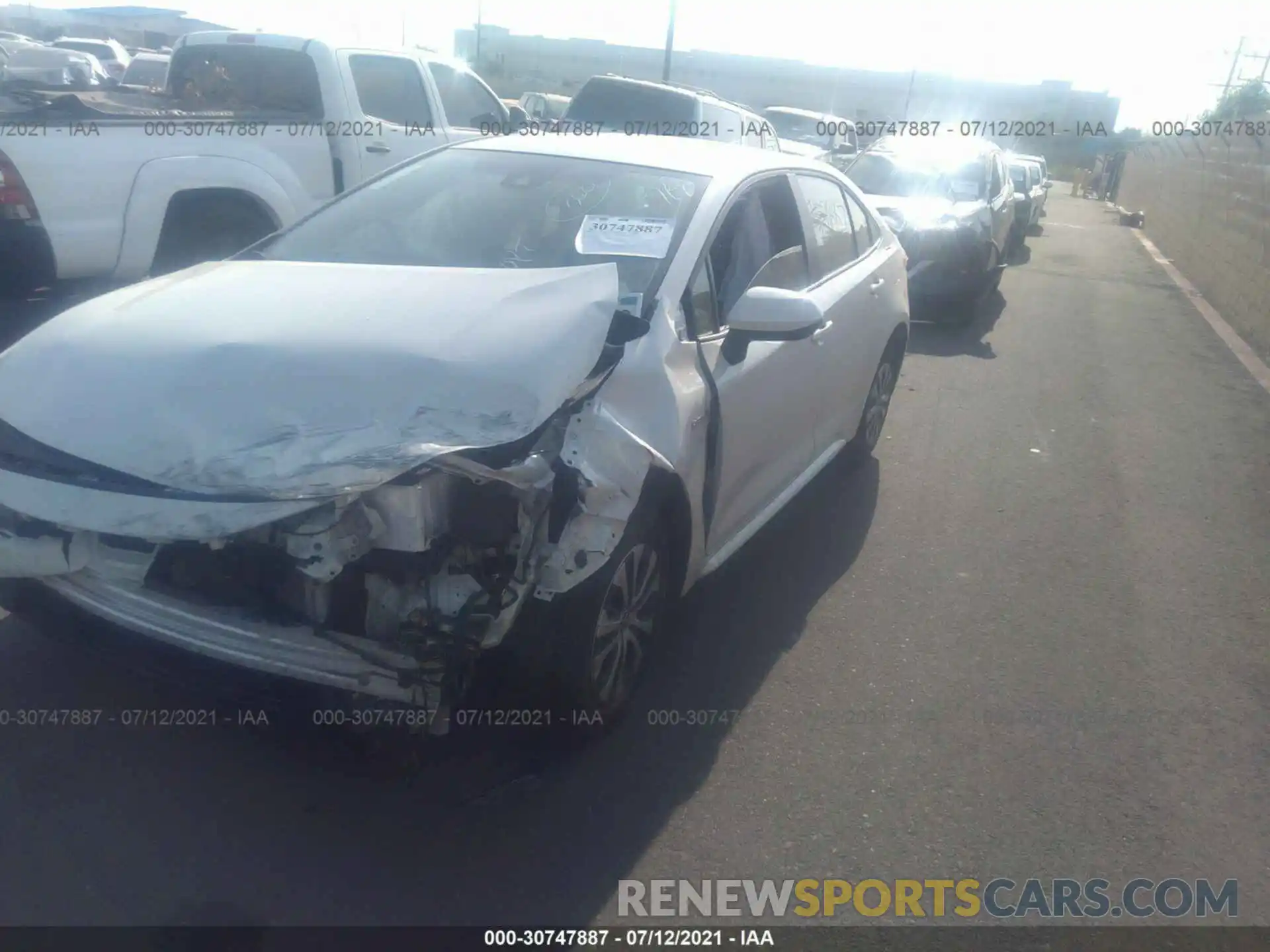 2 Photograph of a damaged car JTDEAMDE7MJ027051 TOYOTA COROLLA 2021