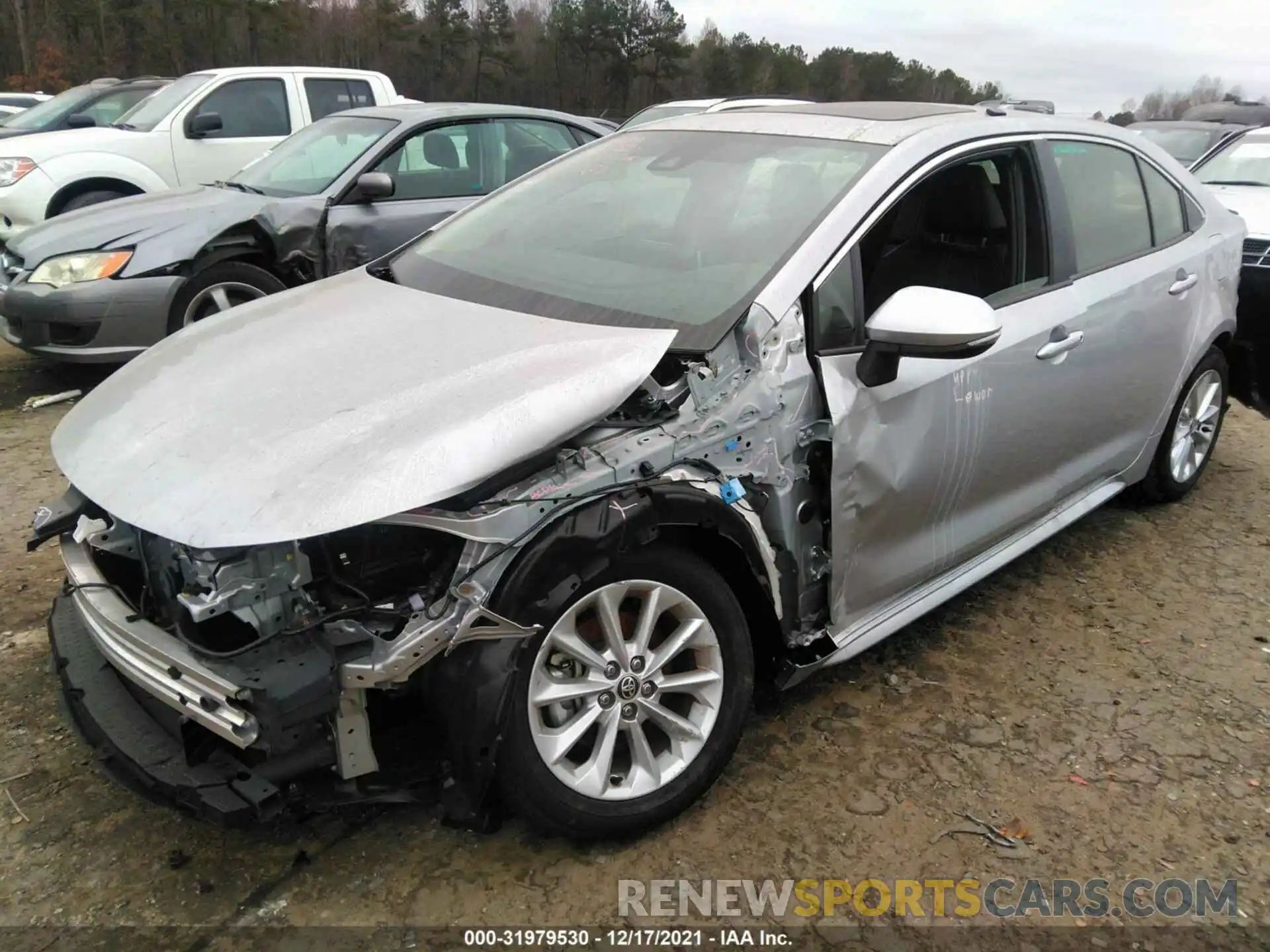 2 Photograph of a damaged car JTDFPMAE7MJ159637 TOYOTA COROLLA 2021