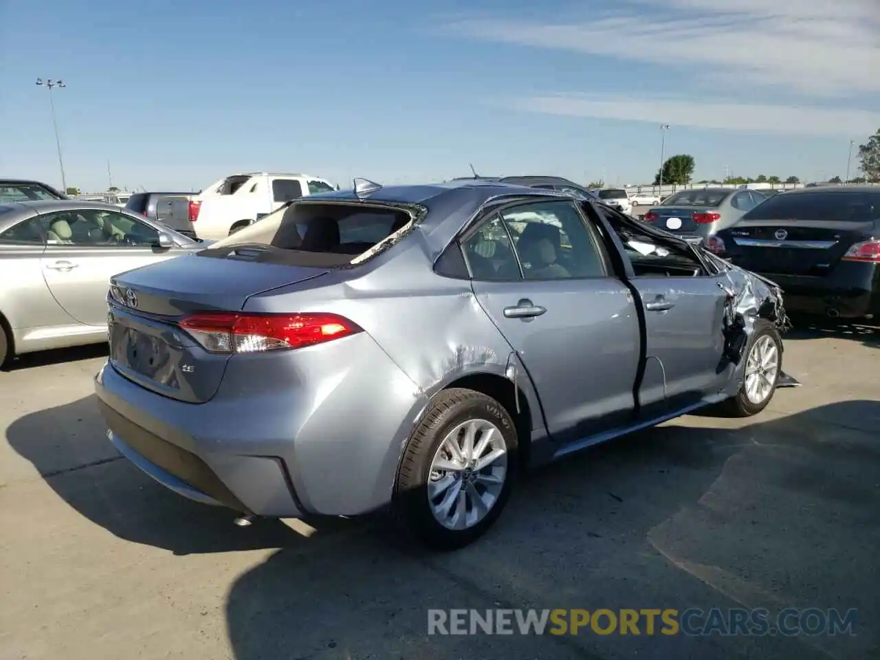 4 Photograph of a damaged car JTDVPMAE9MJ148635 TOYOTA COROLLA 2021