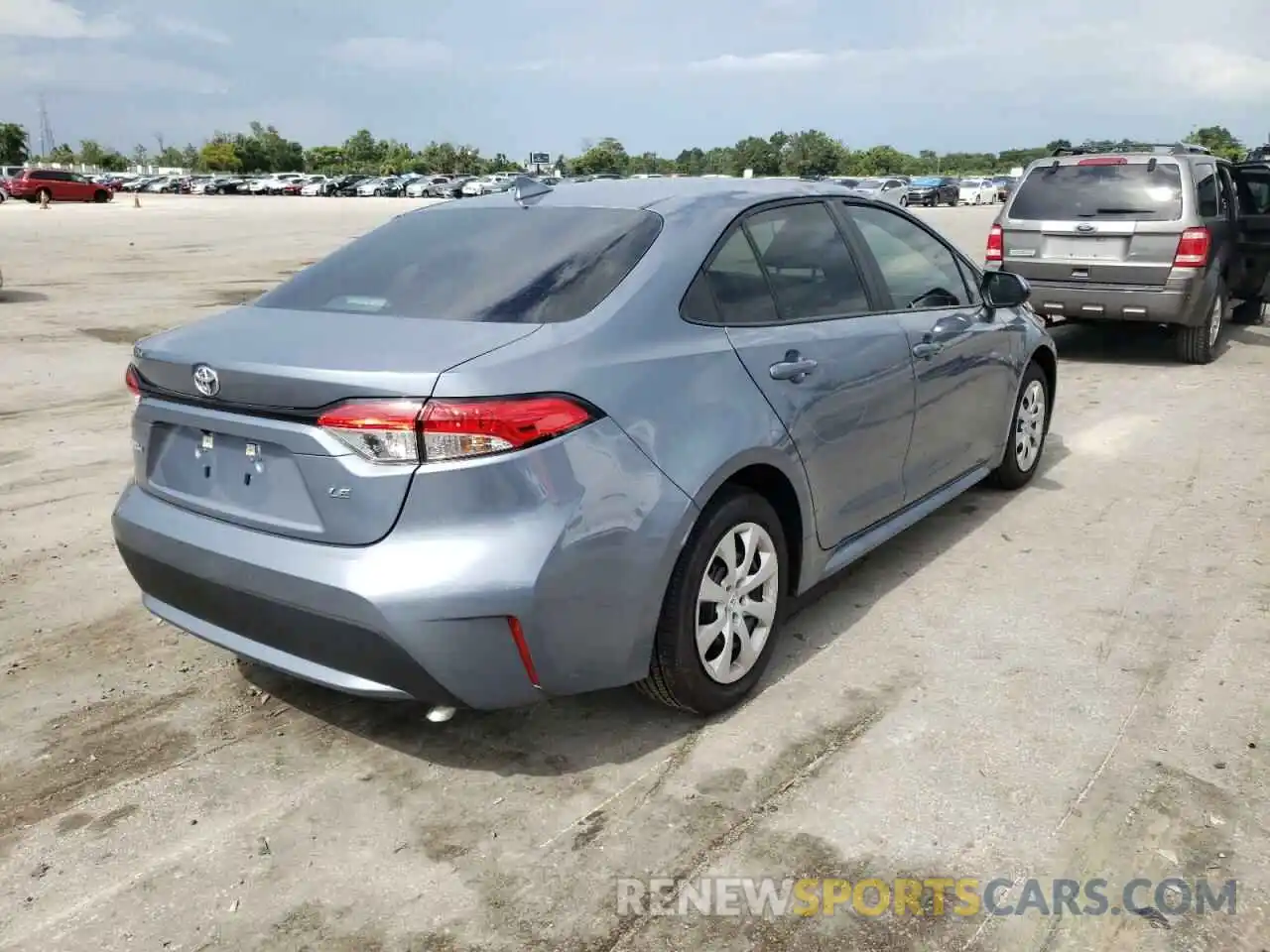 4 Photograph of a damaged car 5YFEPMAE6NP307947 TOYOTA COROLLA 2022