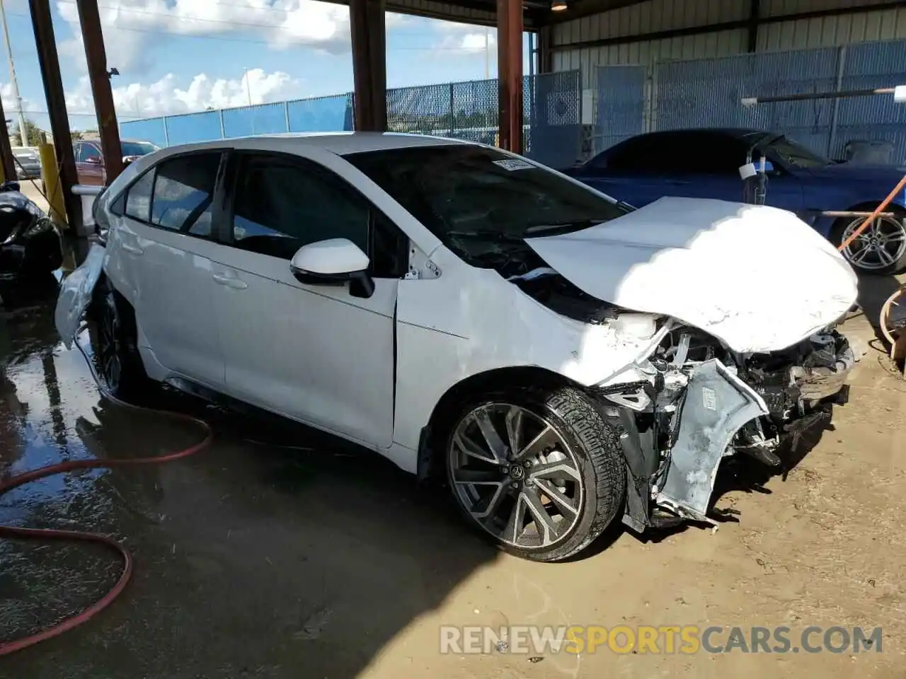 4 Photograph of a damaged car 5YFS4MCE7NP129877 TOYOTA COROLLA 2022