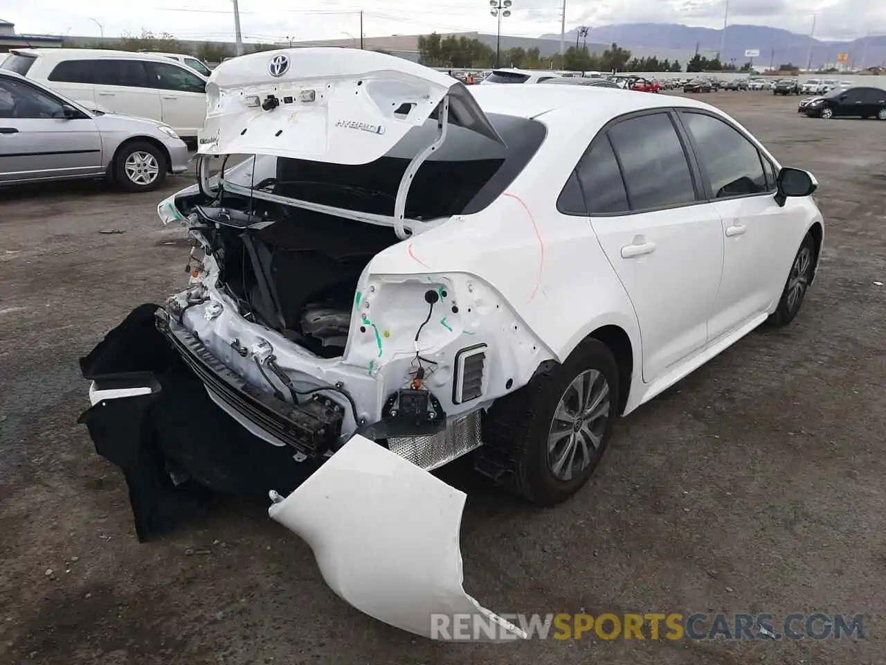 4 Photograph of a damaged car JTDEAMDE6NJ039631 TOYOTA COROLLA 2022