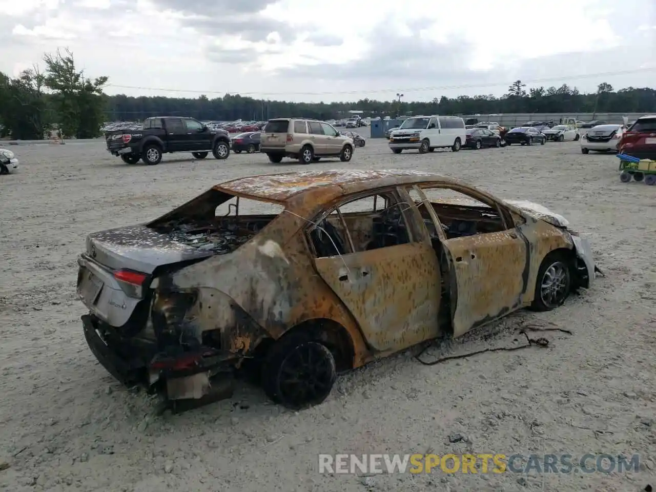 4 Photograph of a damaged car JTDEAMDE9NJ043351 TOYOTA COROLLA 2022