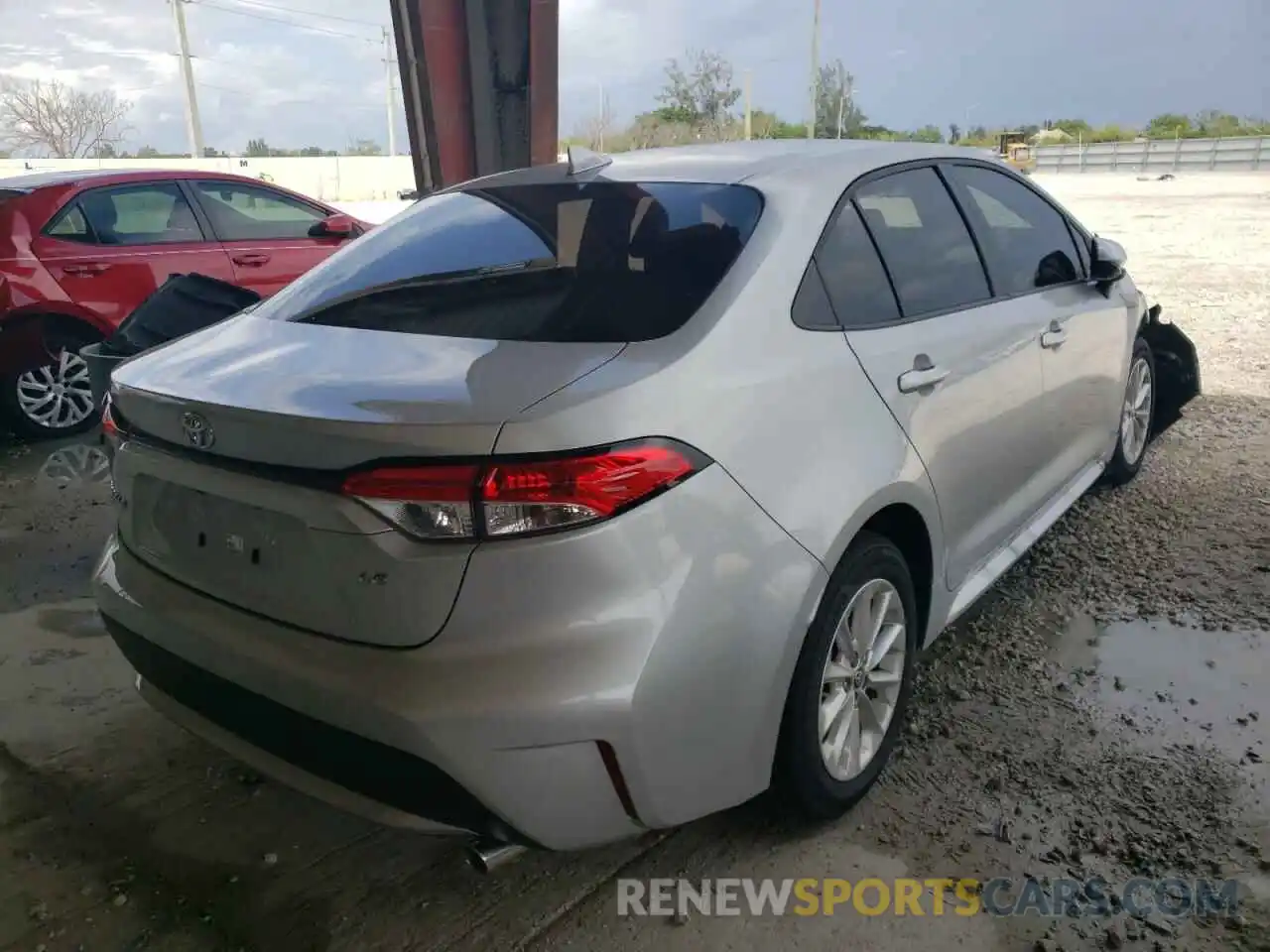 4 Photograph of a damaged car JTDHPMAE8NJ206409 TOYOTA COROLLA 2022