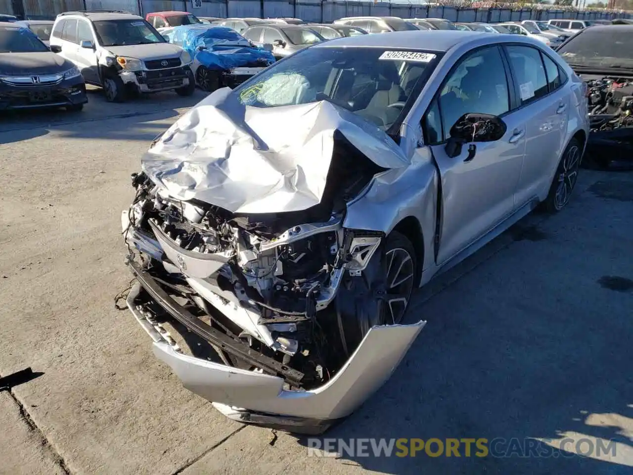 2 Photograph of a damaged car JTDS4MCE7NJ089255 TOYOTA COROLLA 2022