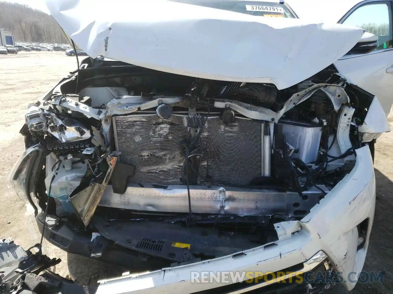 7 Photograph of a damaged car 5TDDZRFH6KS987275 TOYOTA HIGHLANDER 2019